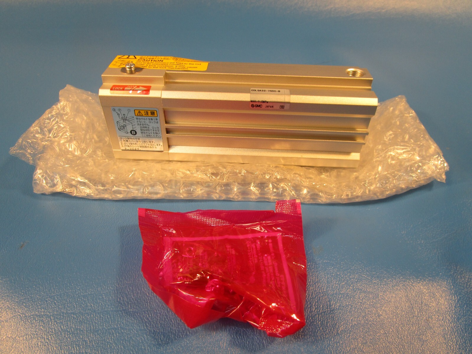 SMC CDLQA32-75DC-B Compact Lock Cylinder, low profile design
