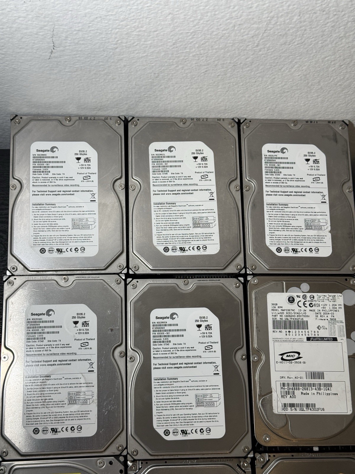 Lot of 12 Hard Drives Seagate WD Maxtor Fujitsu + Brackets UNTESTED