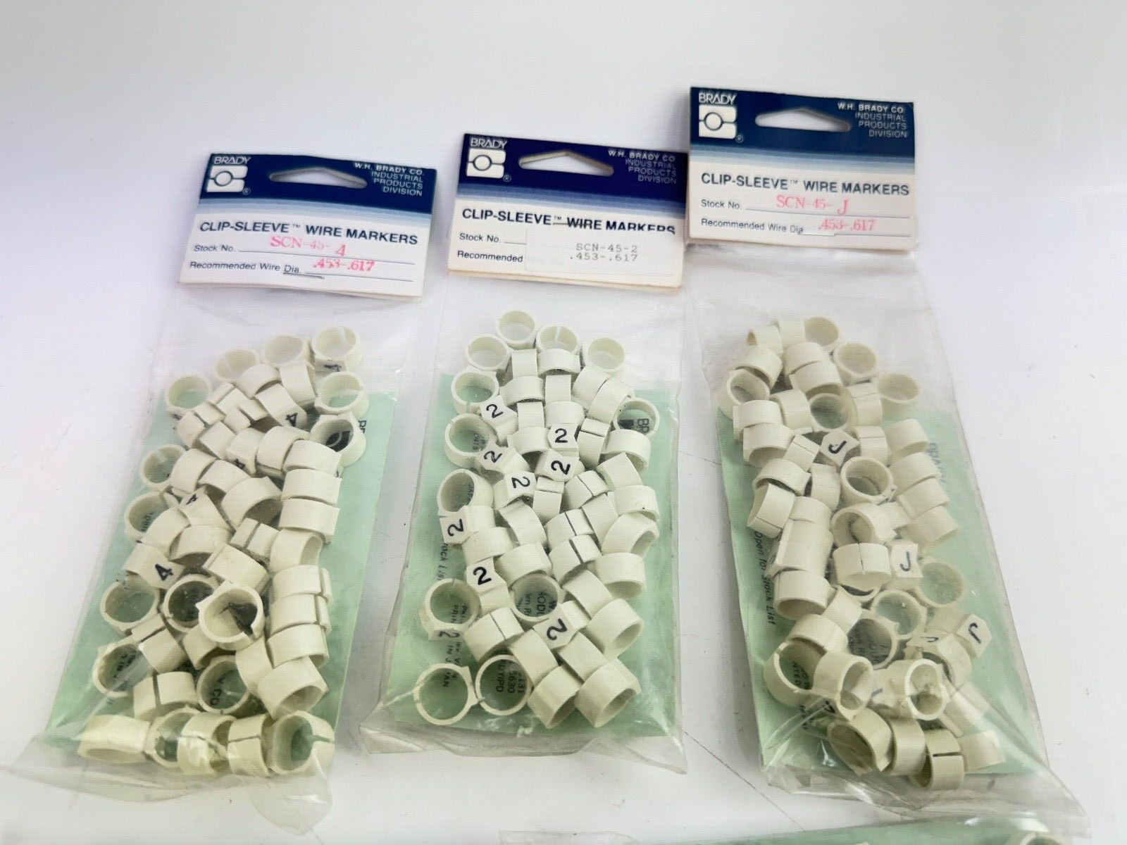 Lot of 7 Assorted Brady SCN-45 Clip-Sleeve Wire Markers 0, 1, 2, 3, 4, J, P