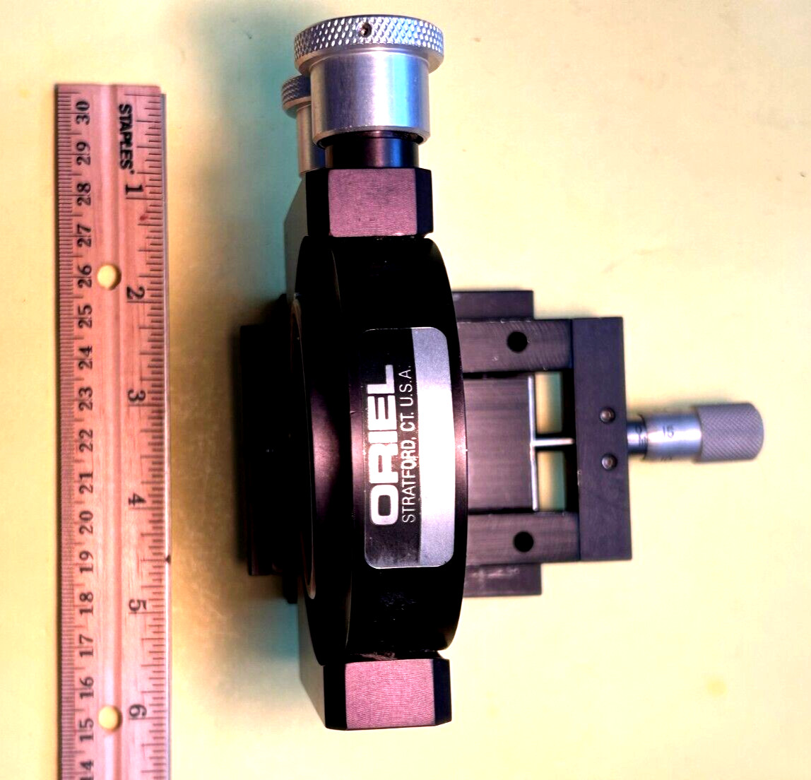 Oriel model 17701 Gimbal mirror mount on linear slide with micrometer.