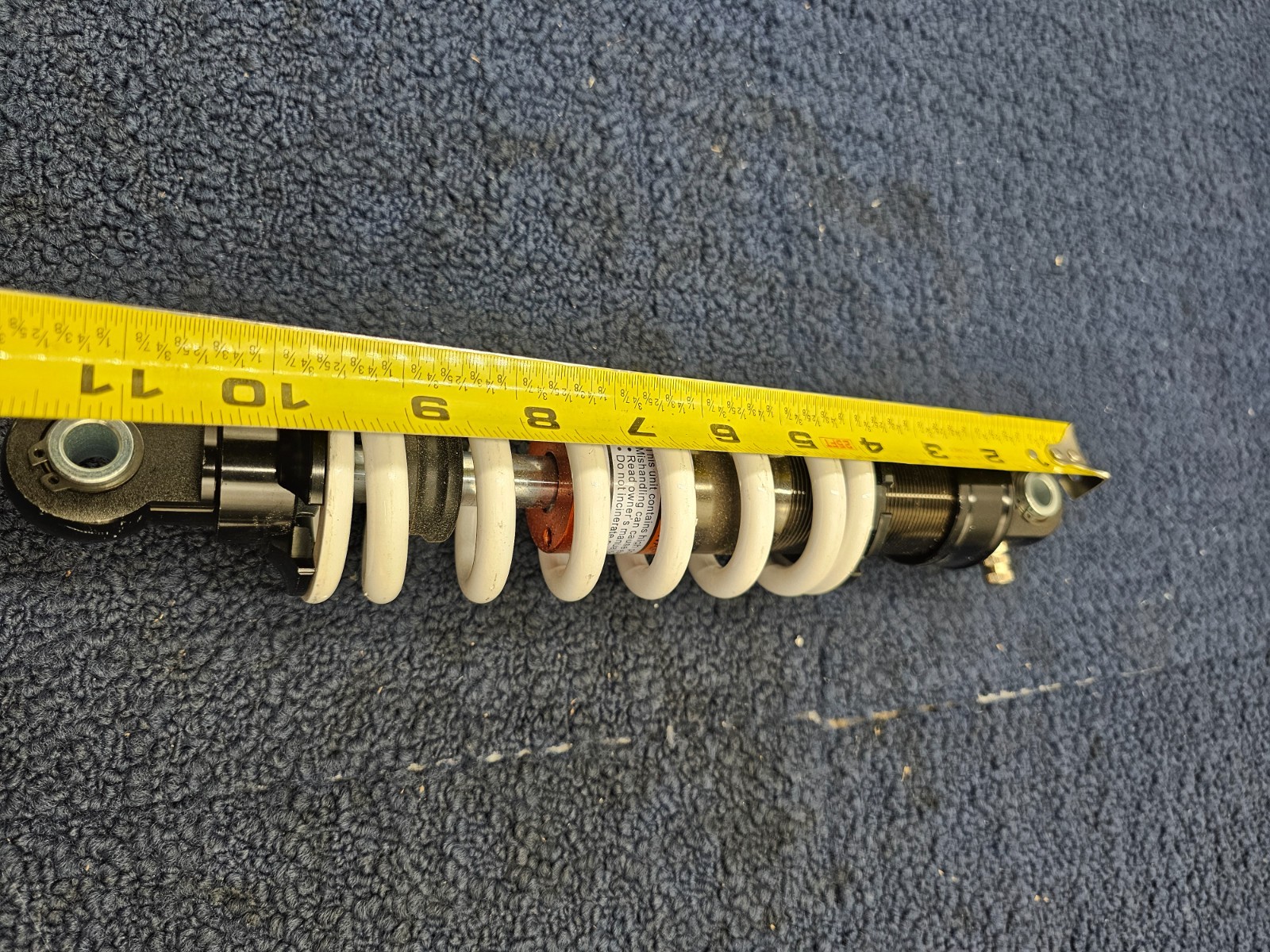 2508231141 Adjustable Shock Absorber Black Body, White Spring