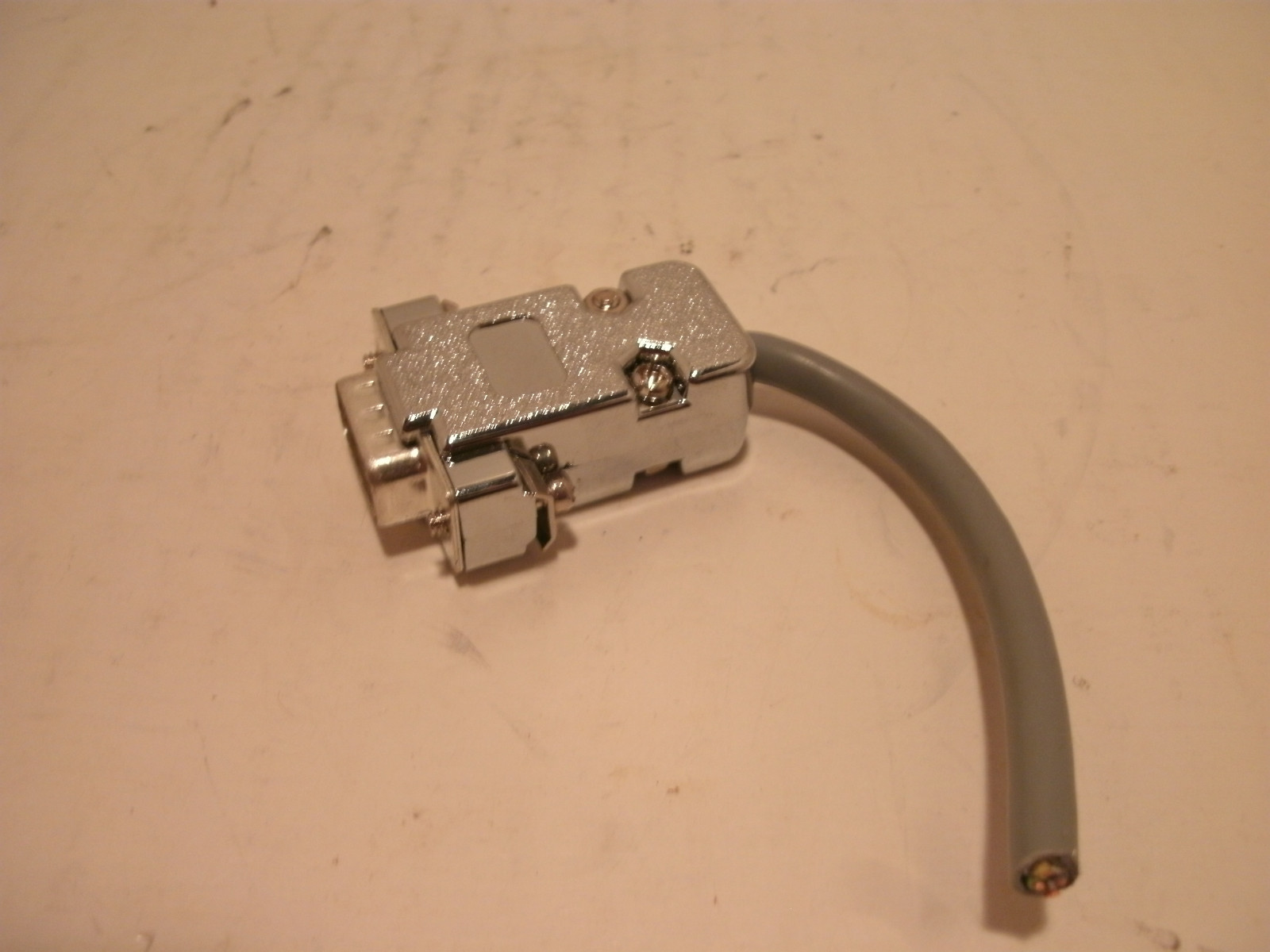 GENERIC MODEM PLUG 9 PIN WITH 3 INCH CORD PLASTIC PLUG CHROME FINISH