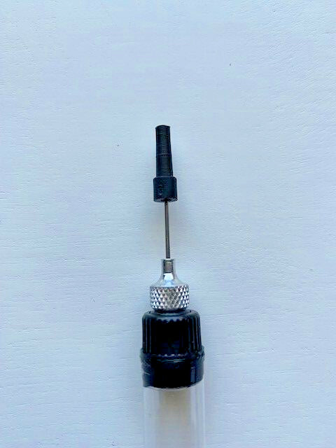 Super Lube Multi-Use Synthetic Oil 4 fl. oz. and a Precision Oiler