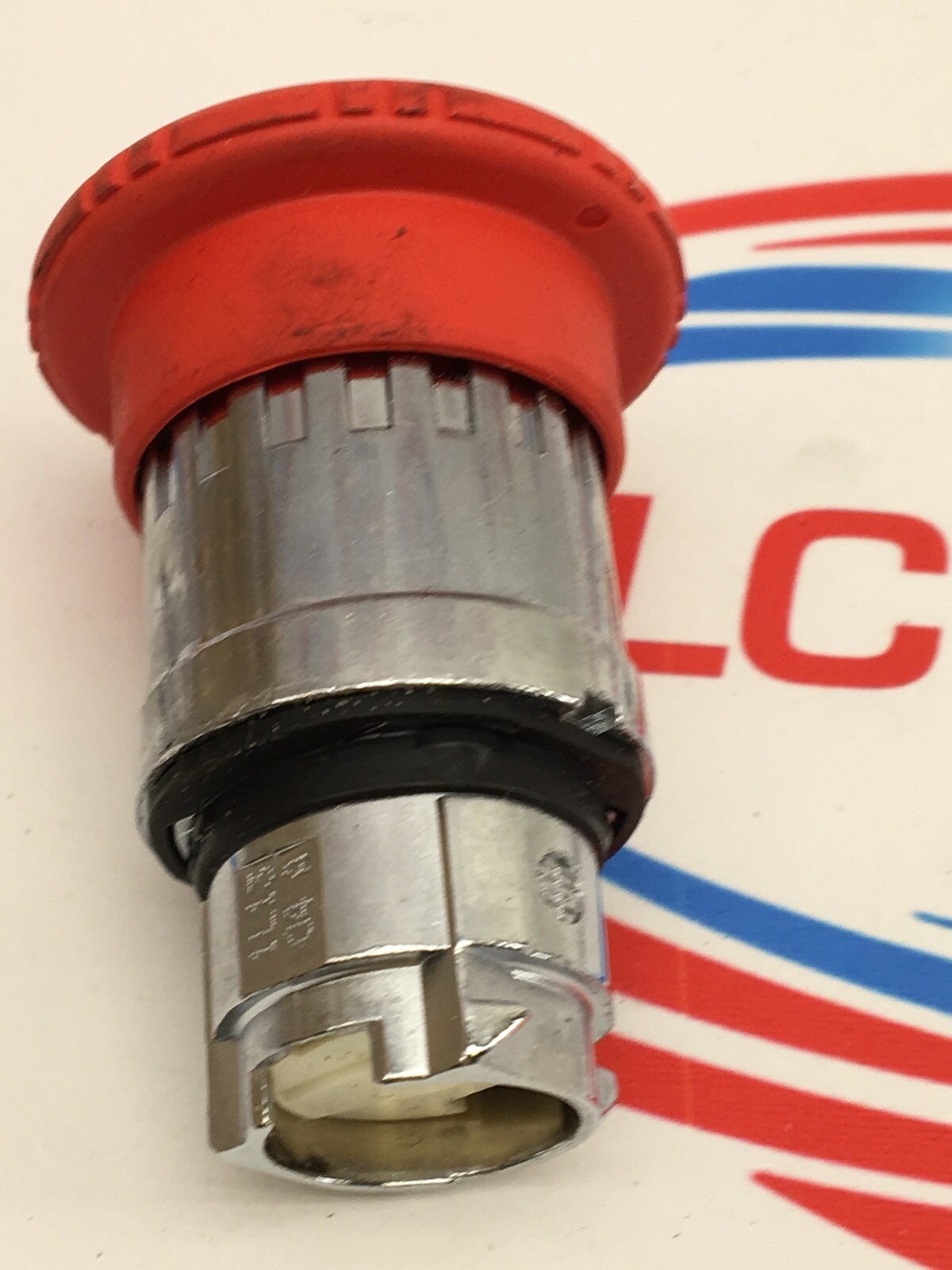 1L13 Q4 A RED E-STOP MUSHROOM HEAD BUTTON OPERATOR
