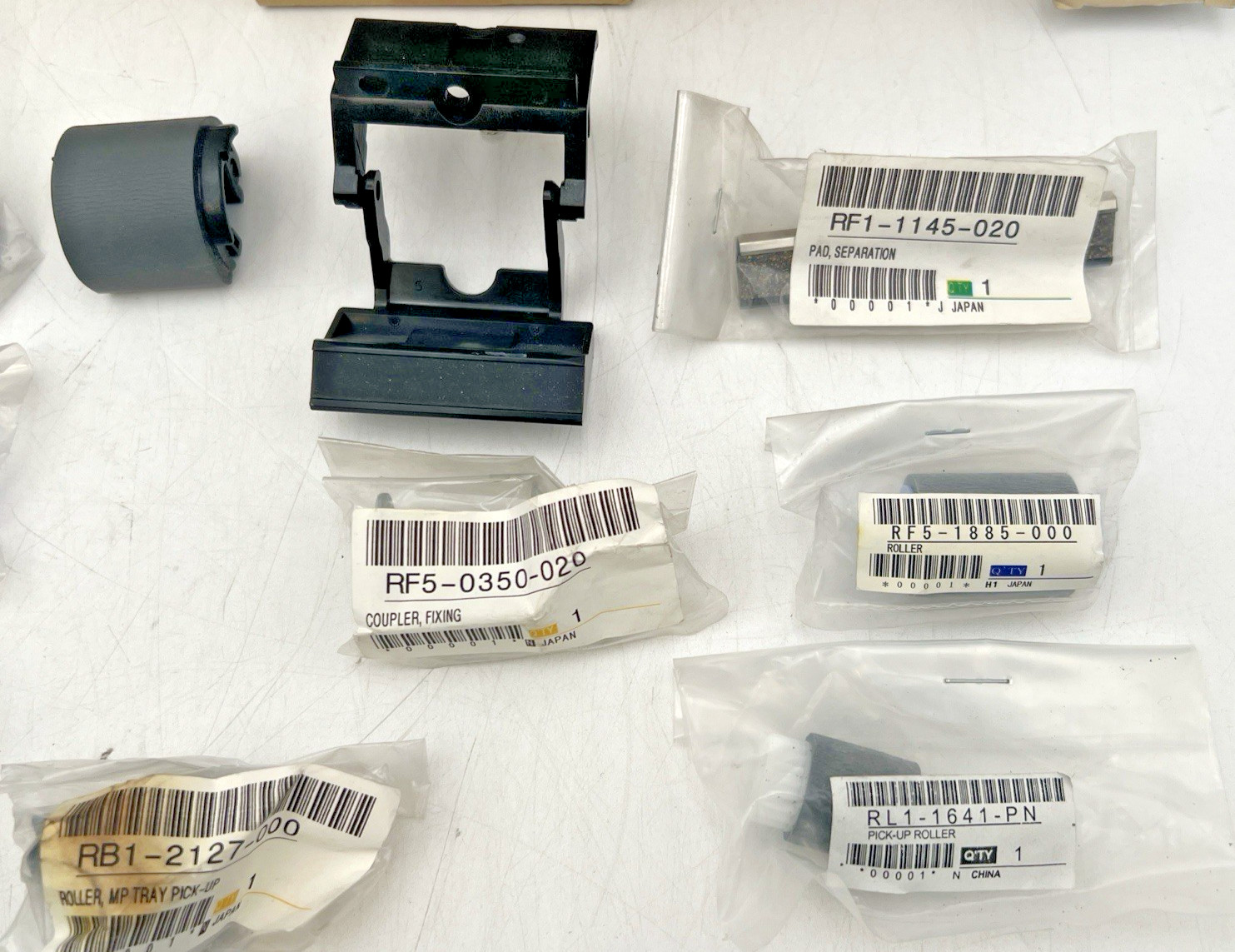 HP HEWLETT PACKARD LASERJET 4 AND OTHERS PARTS ROLLERS PICK-UP ARMS HOLDERS ETC
