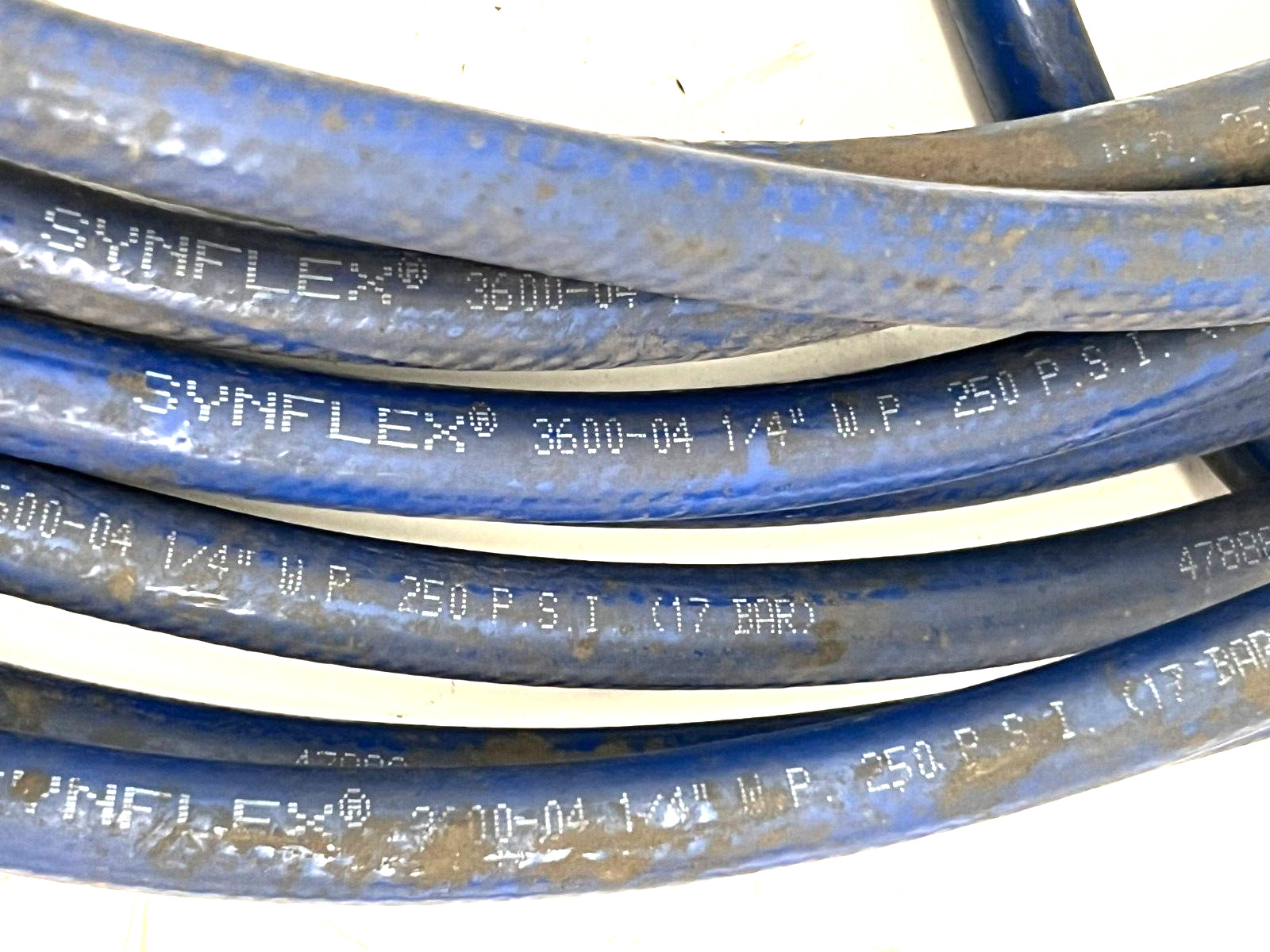SYNFLEX 3600-04 1/4″ WP 250 PSI POLYETHYLENE TUBING APPROX. 50 FT LONG