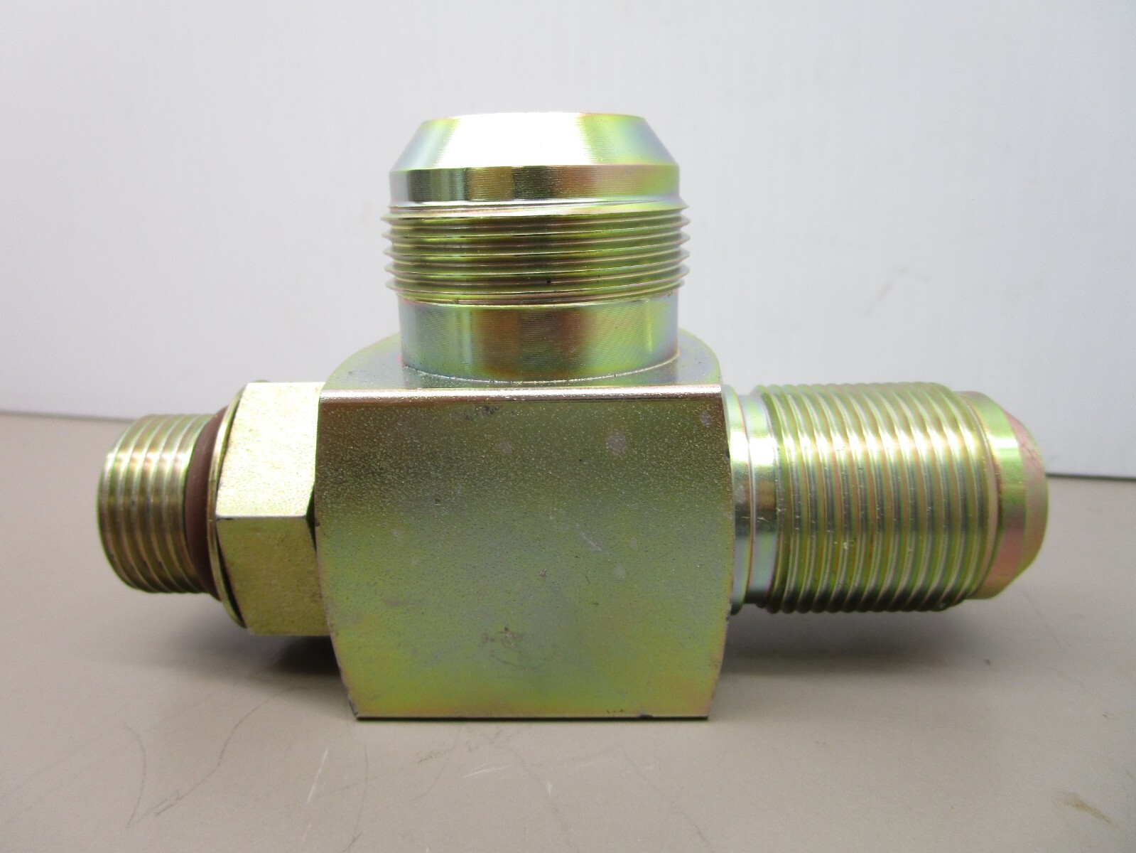New Flyer 115509 Hydraulic Relief Valve Tee 65PSI 1″ ORB x 1-1/4″ x 1-5/8″ JIC