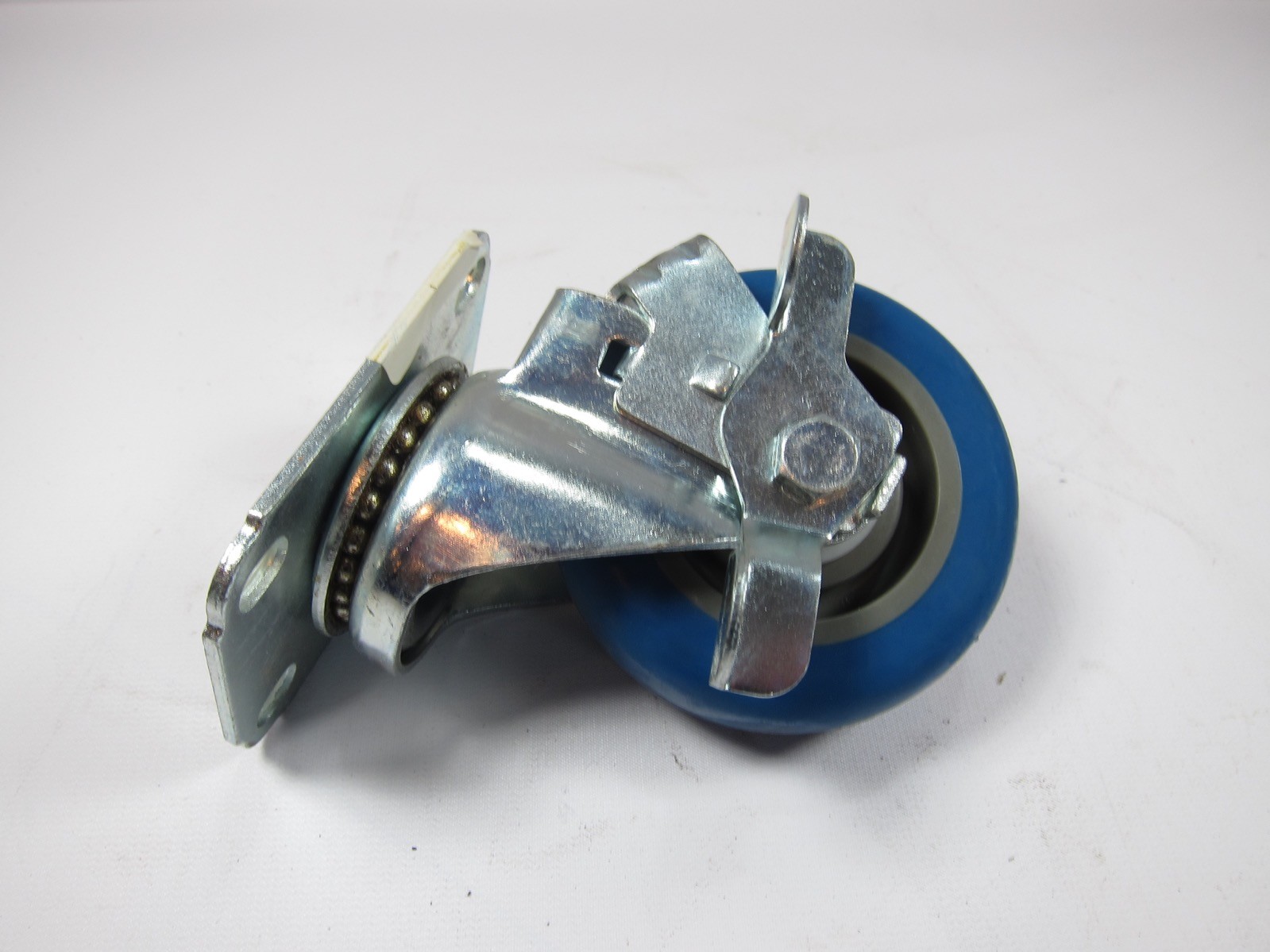 New 5UX86 3-1/2” Locking Light-Duty Swivel Plate Caster, 250 lb. Load Rating