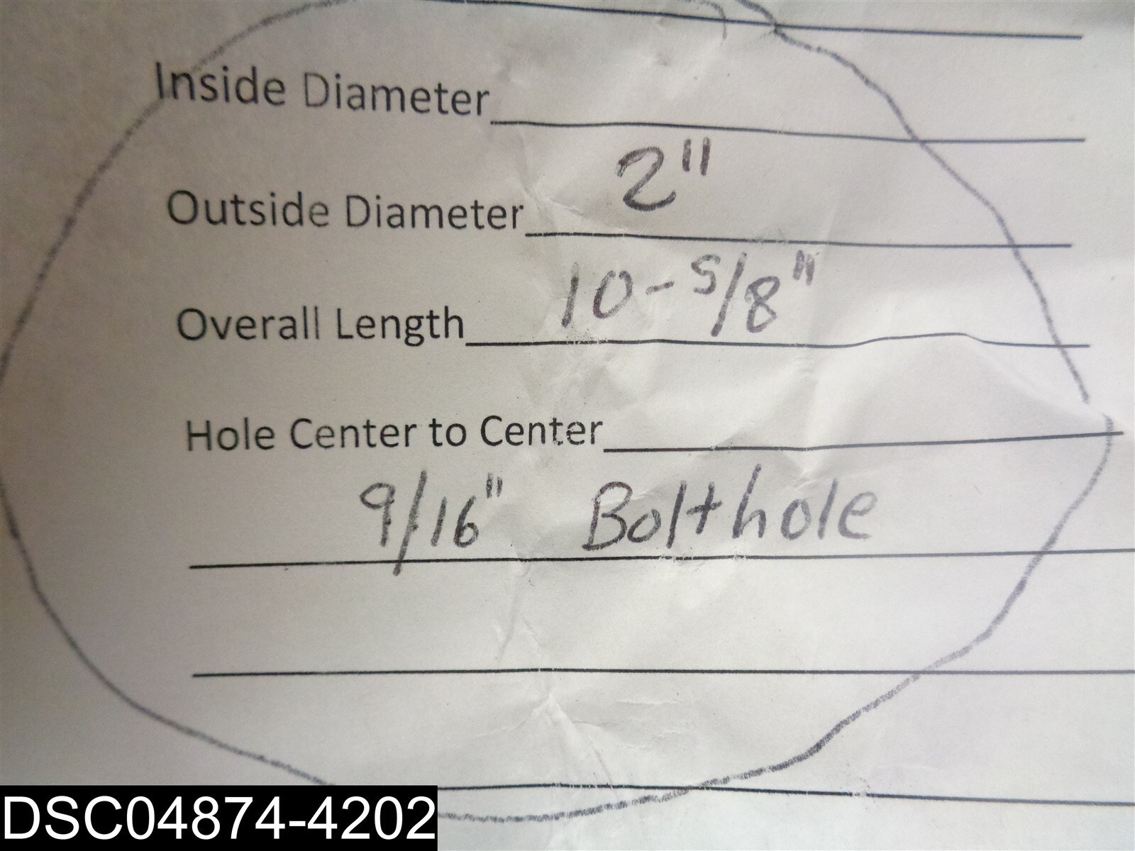 10-5/8″ Long Equipment Pin With 2″ OD and 9/16″ Bolt Hole