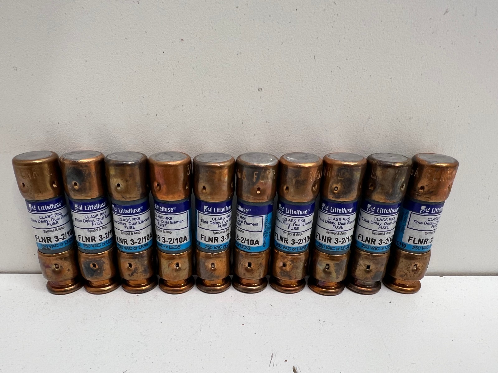 LOT OF (10) NEW OLD STOCK! LITTELFUSE 3-2/10A 250V TIME DELAY FUSES FLNR-3-2/10A