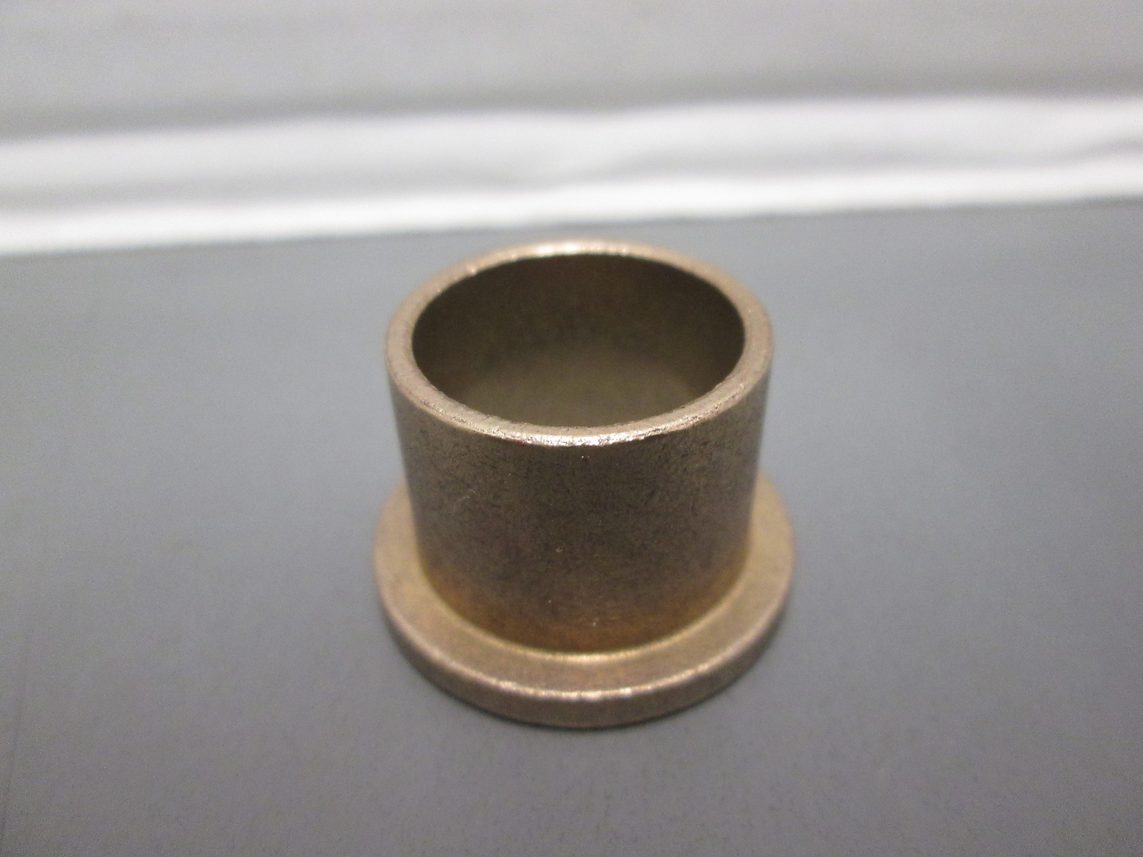 5/8″ X 3/4″ X 5/8″ FLANGED OILITE BRONZE BUSHING