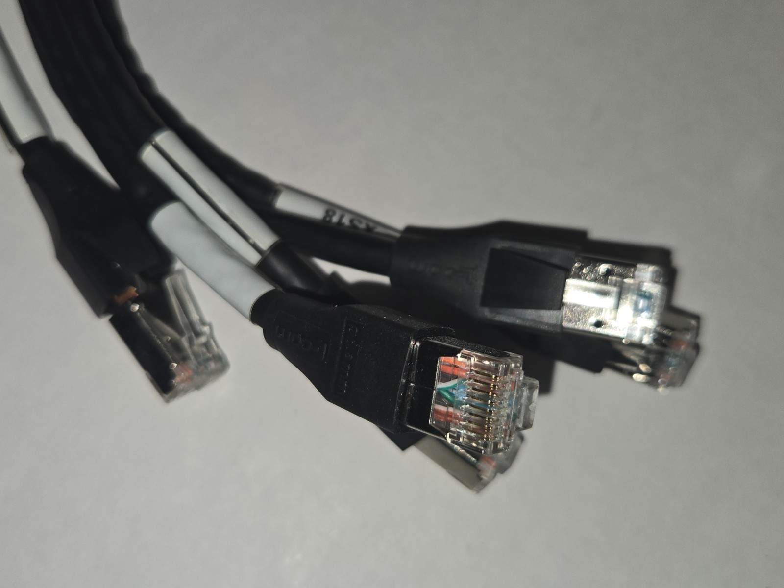5 – L-Com TRD695SRA1BLK-1 Shielded Cat 6 Right Angle Patch Cable Black 1.0 ft