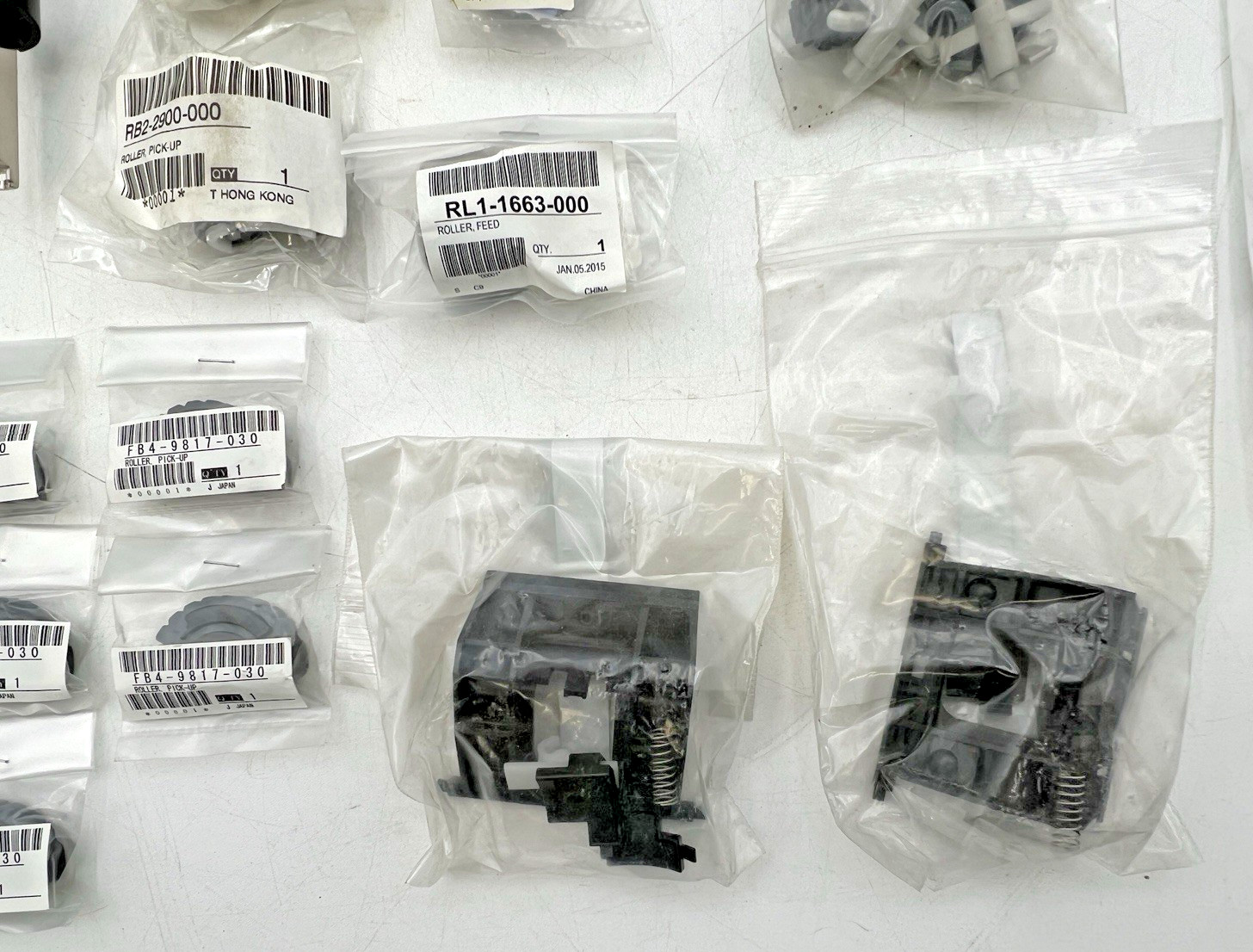 HP HEWLETT PACKARD LASERJET 4 AND OTHERS PARTS ROLLERS PICK-UP ARMS HOLDERS ETC