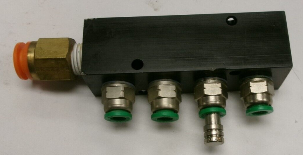 4-Port Manifold w/ (1) SMC Spore 3/8, (4) Numatics 1/4 Fittings included #T1111S