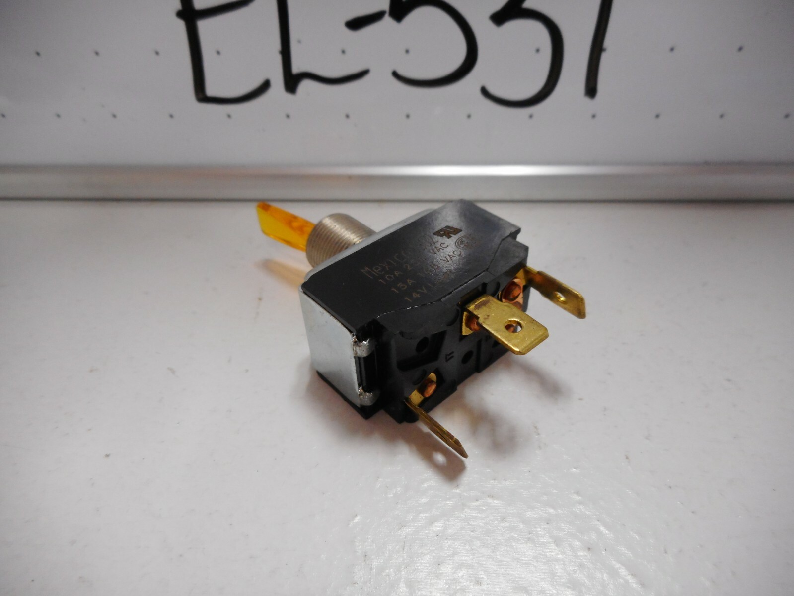 NOS SPST ILLUMINATED AMBER TOGGLE SWITCH, 14V LAMP, 15 AMP