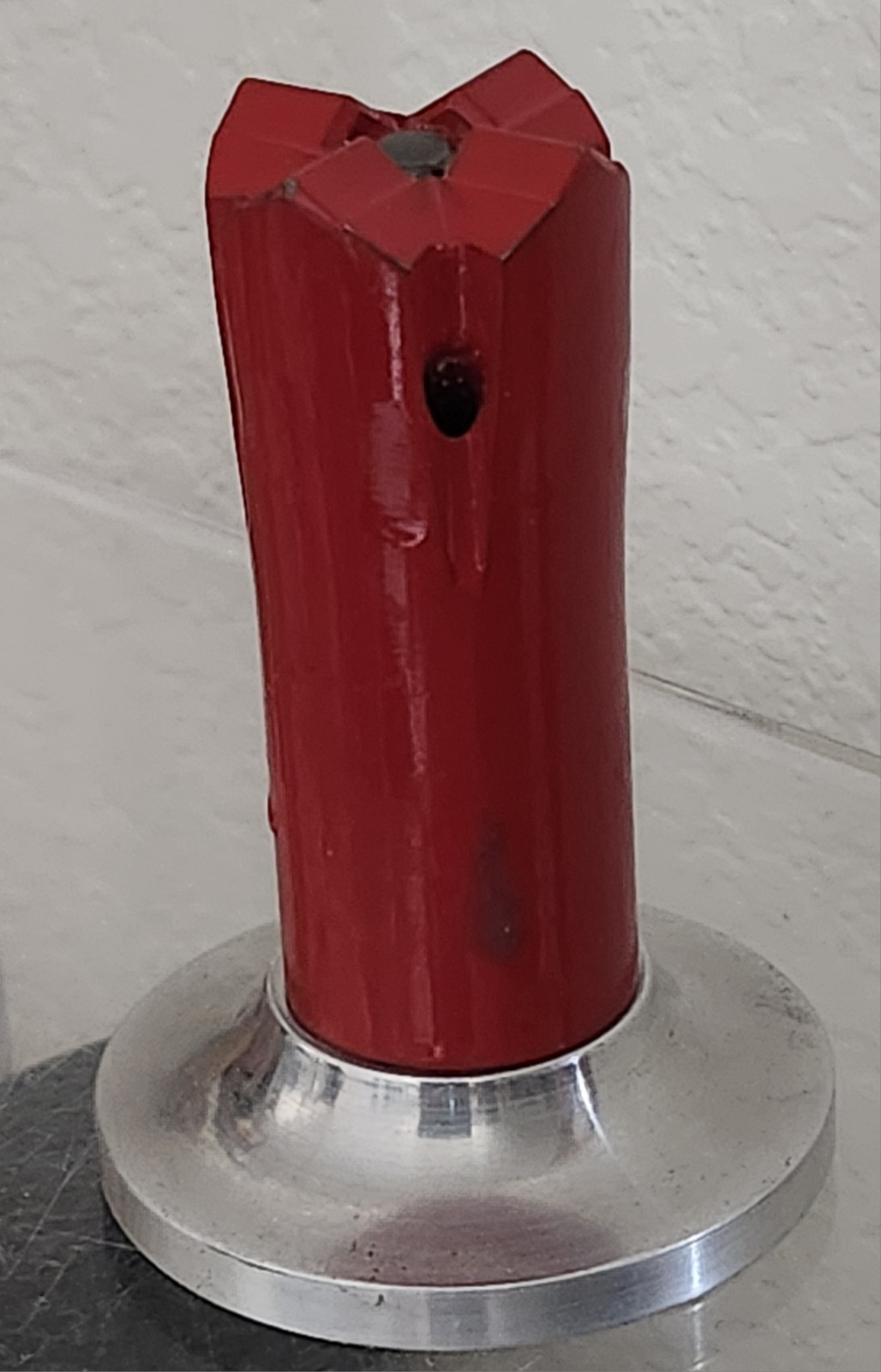 Rock Drill Bit Unmarked Red 1 1/4″ Diameter x 2 15/16″ tall w/ Aluminum Base
