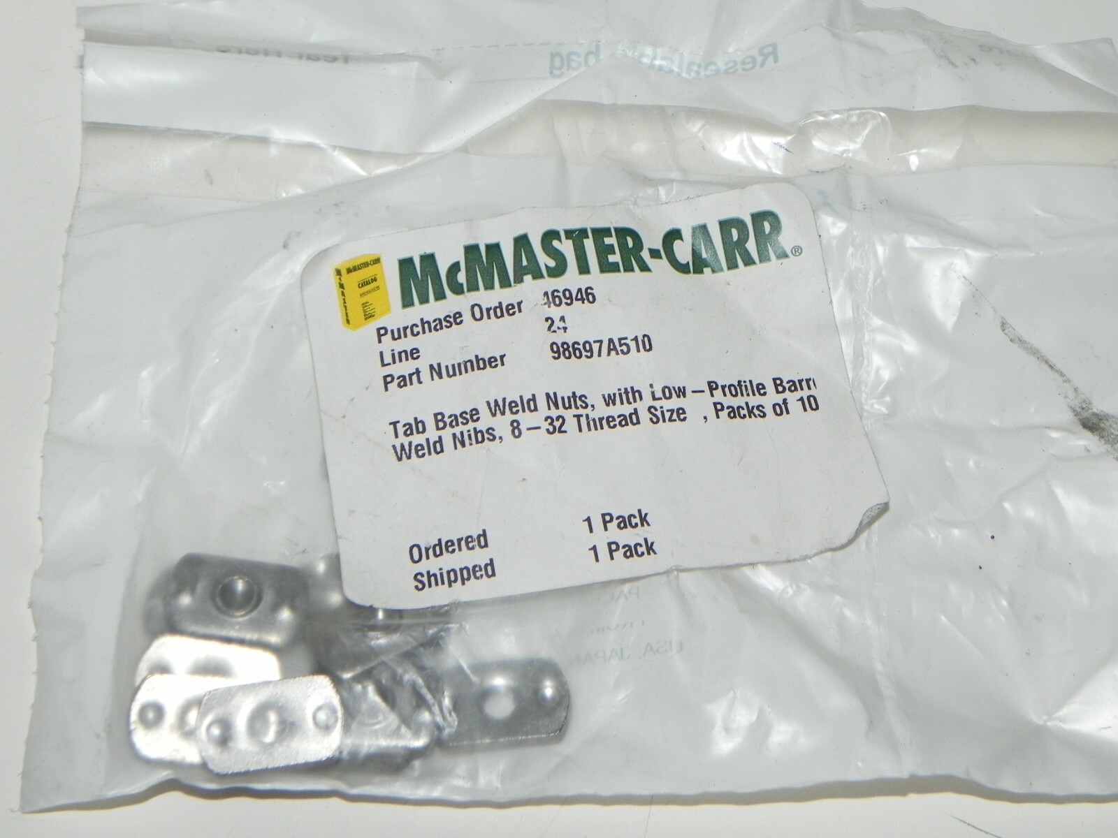 Pack of McMaster-Carr Weld nuts #98697A510..10 in pack, Low profile 8-32 thread