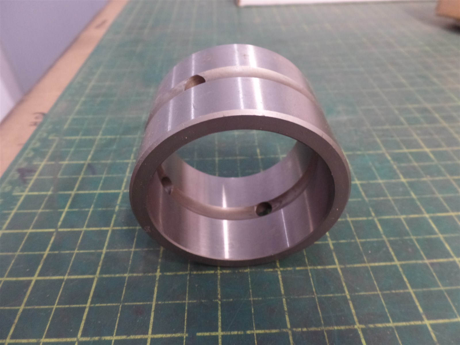 GENUINE TEREX 10-210956822 BUSHING ASSEMBLY, TROJAN O&K 10210956822, N.O.S
