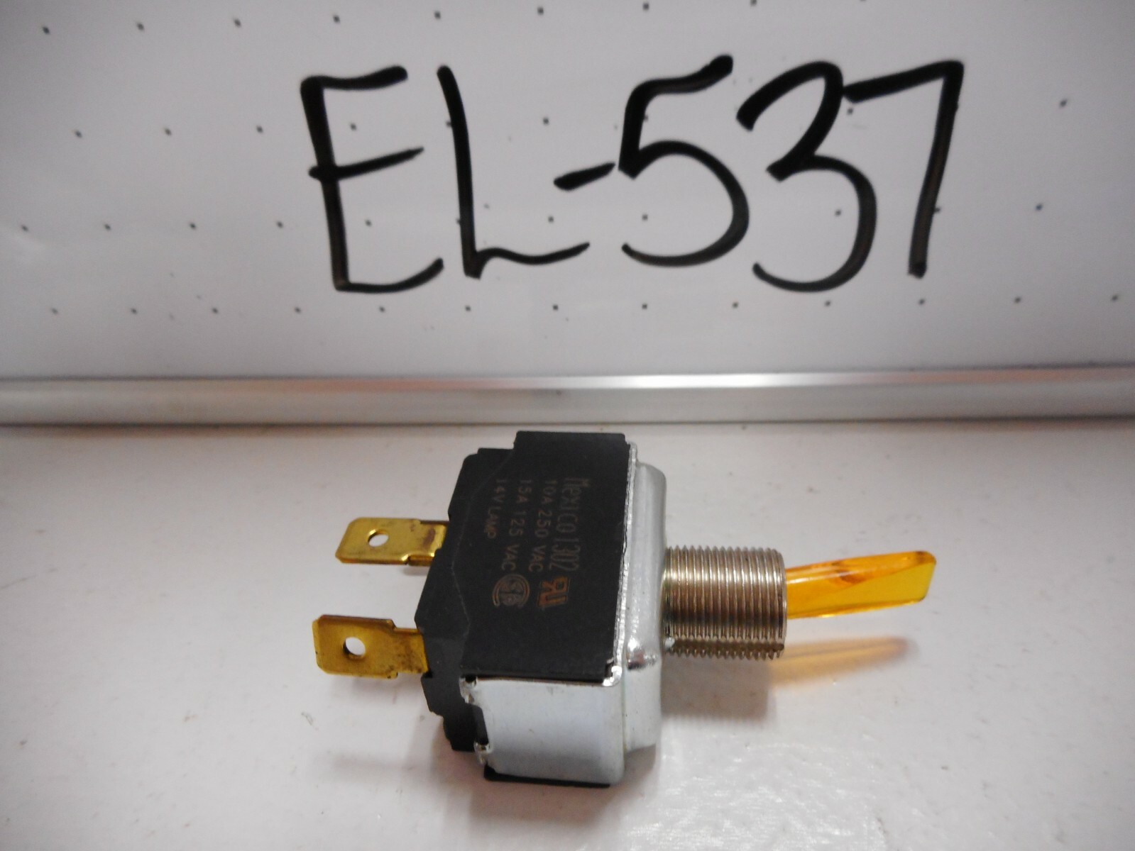 NOS SPST ILLUMINATED AMBER TOGGLE SWITCH, 14V LAMP, 15 AMP