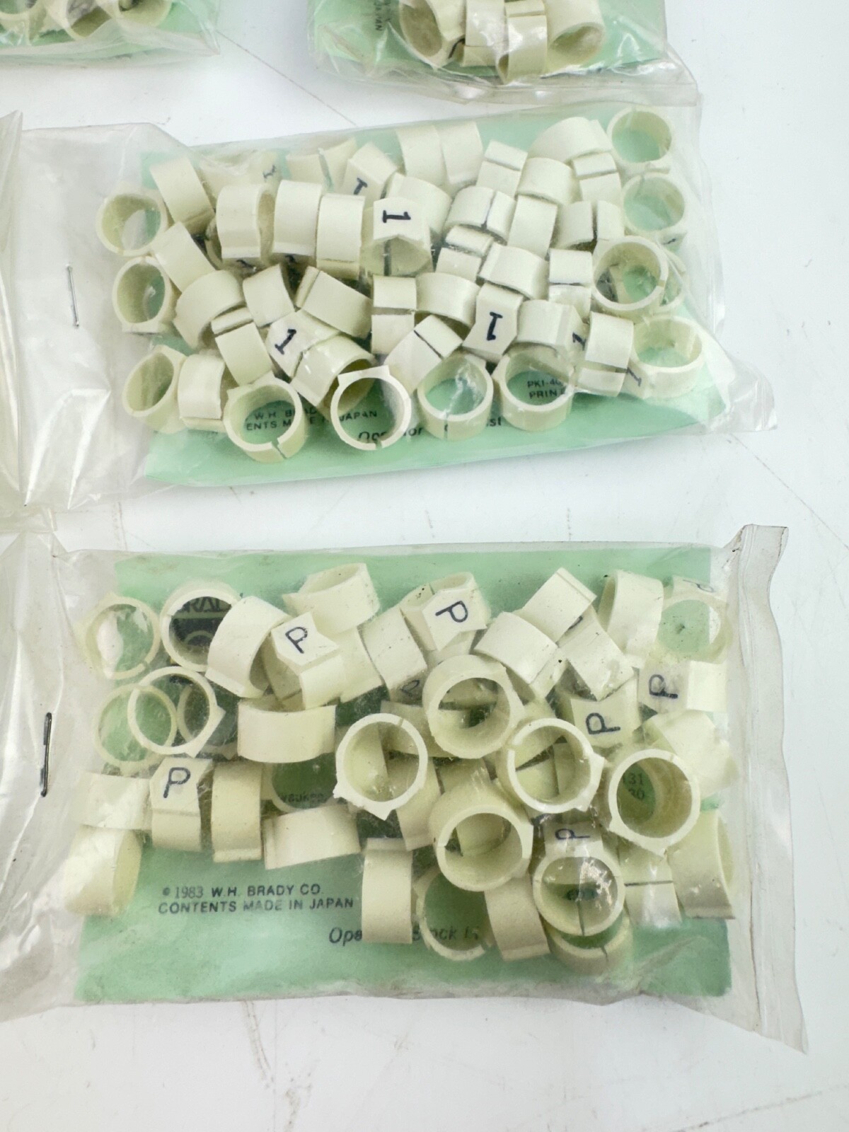 Lot of 7 Assorted Brady SCN-45 Clip-Sleeve Wire Markers 0, 1, 2, 3, 4, J, P