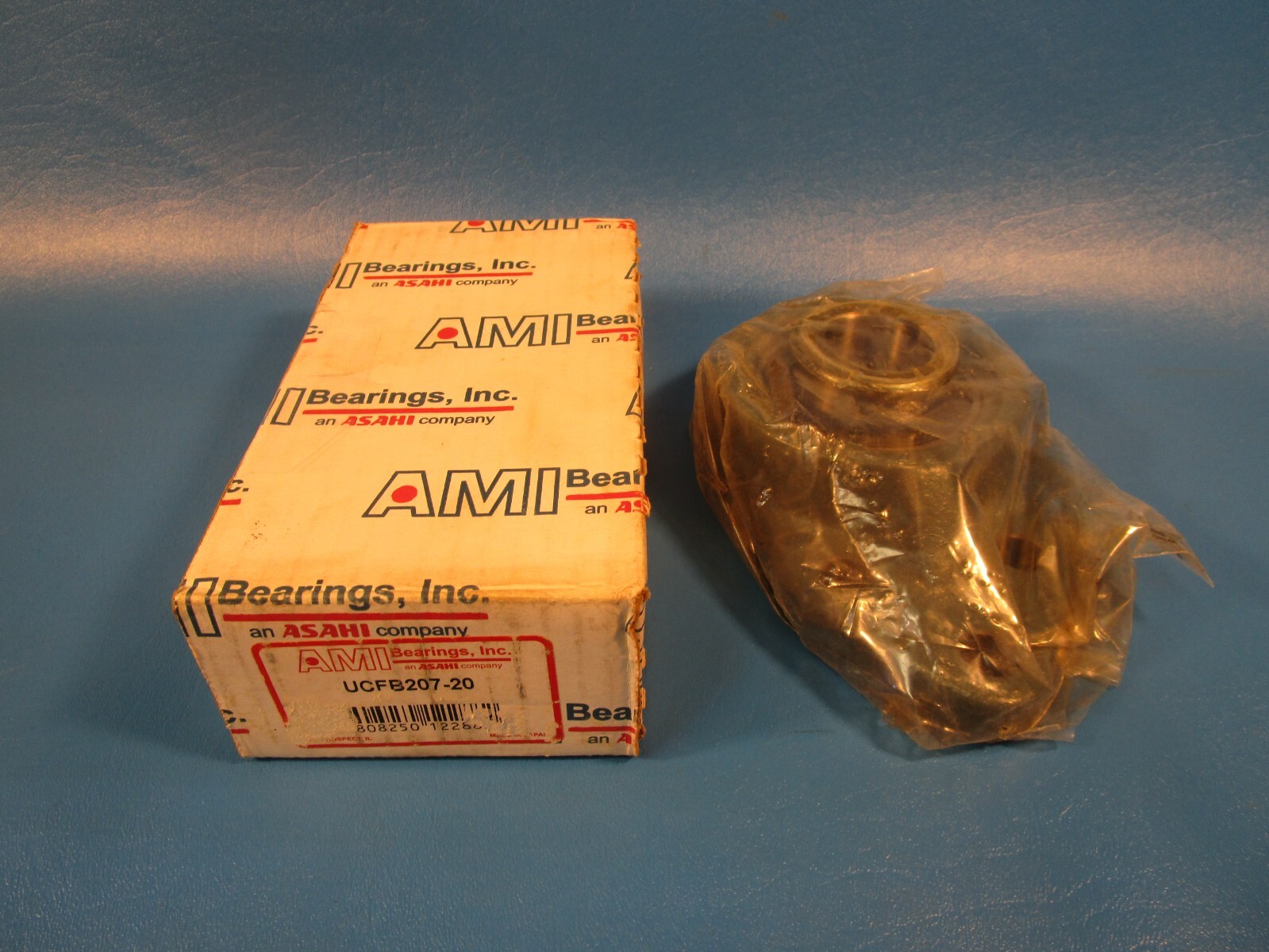 AMI UCFB207-20 Flange-Mount Ball Bearing Unit, 3-Bolt Bracket, 1-1/4” Bore, Cast