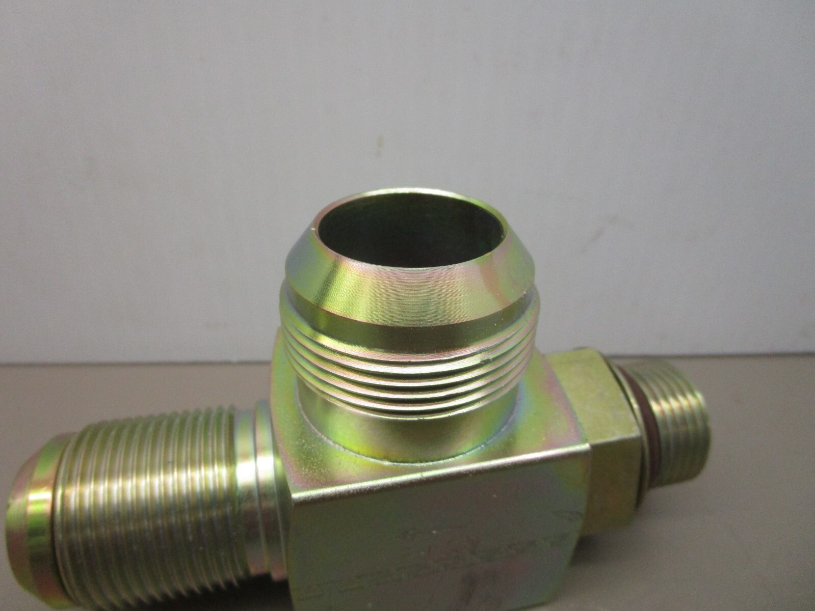 New Flyer 115509 Hydraulic Relief Valve Tee 65PSI 1″ ORB x 1-1/4″ x 1-5/8″ JIC