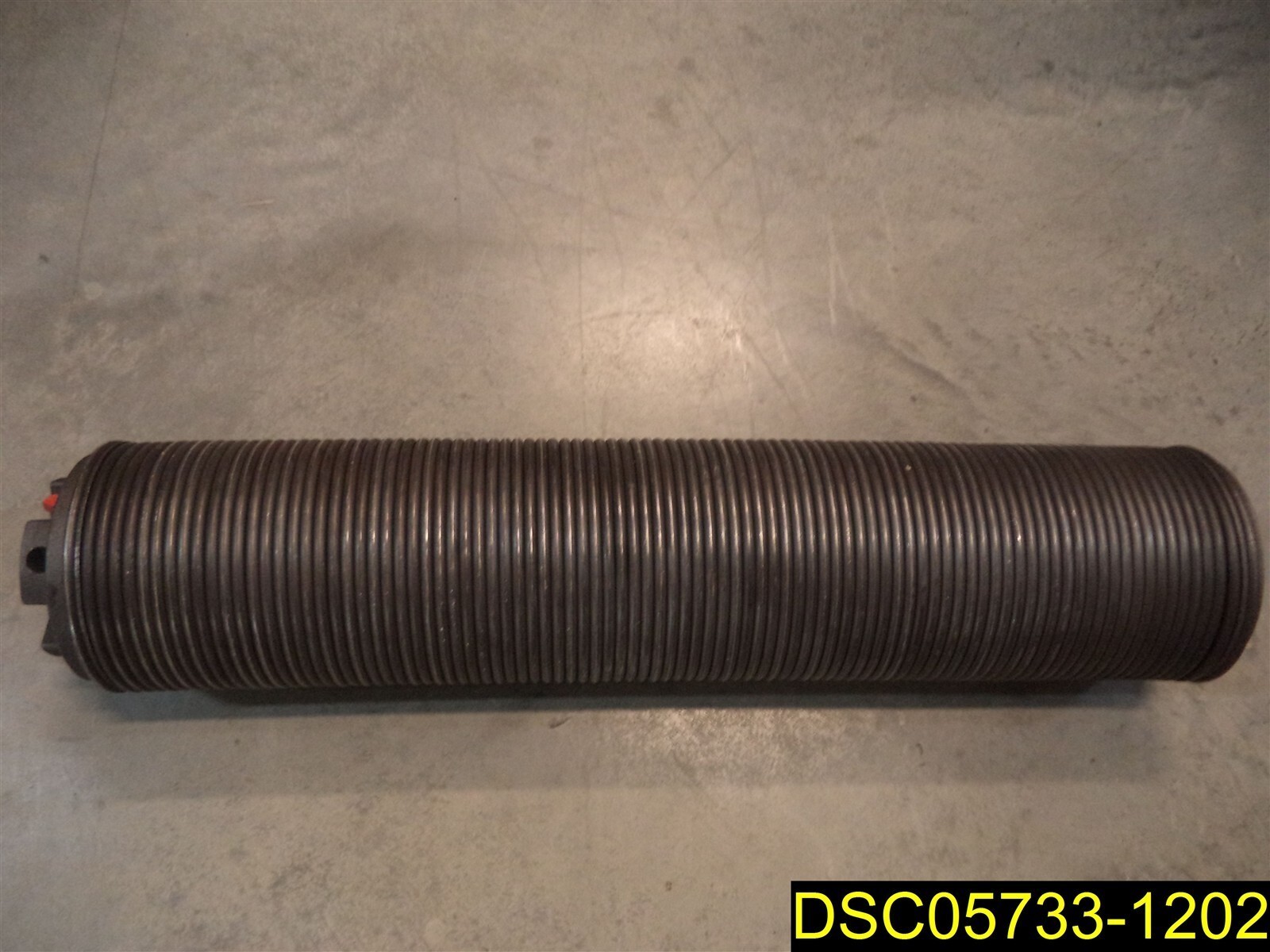 8″ O.D. x 39 1/4″ overall length Overhead Door Torsion Spring, 3/8″ thick spring