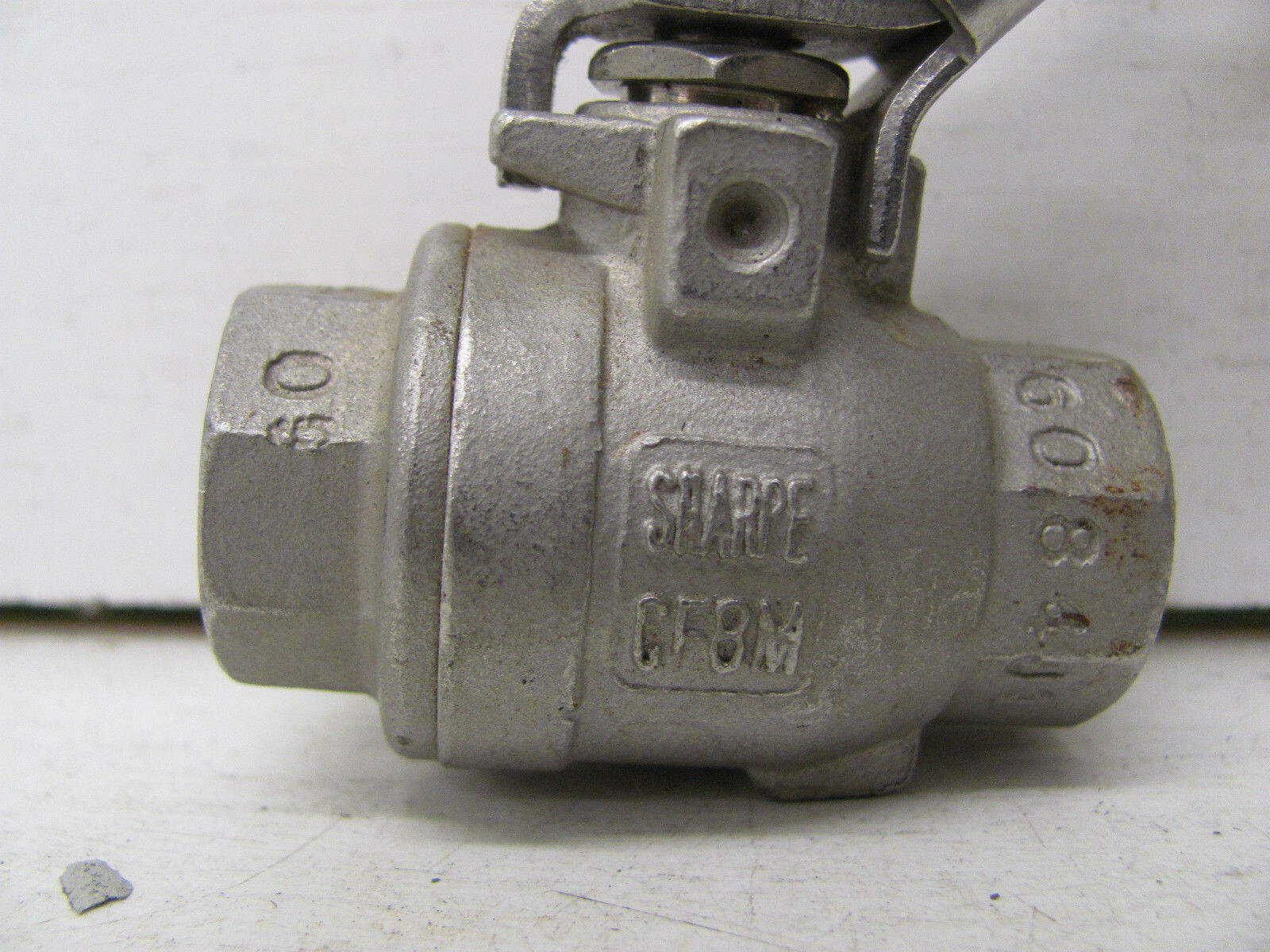 SHARPE LOCKING BALL VALVE CF8M 1/4″ 1000CWP W/ ON OFF HANDLE USED
