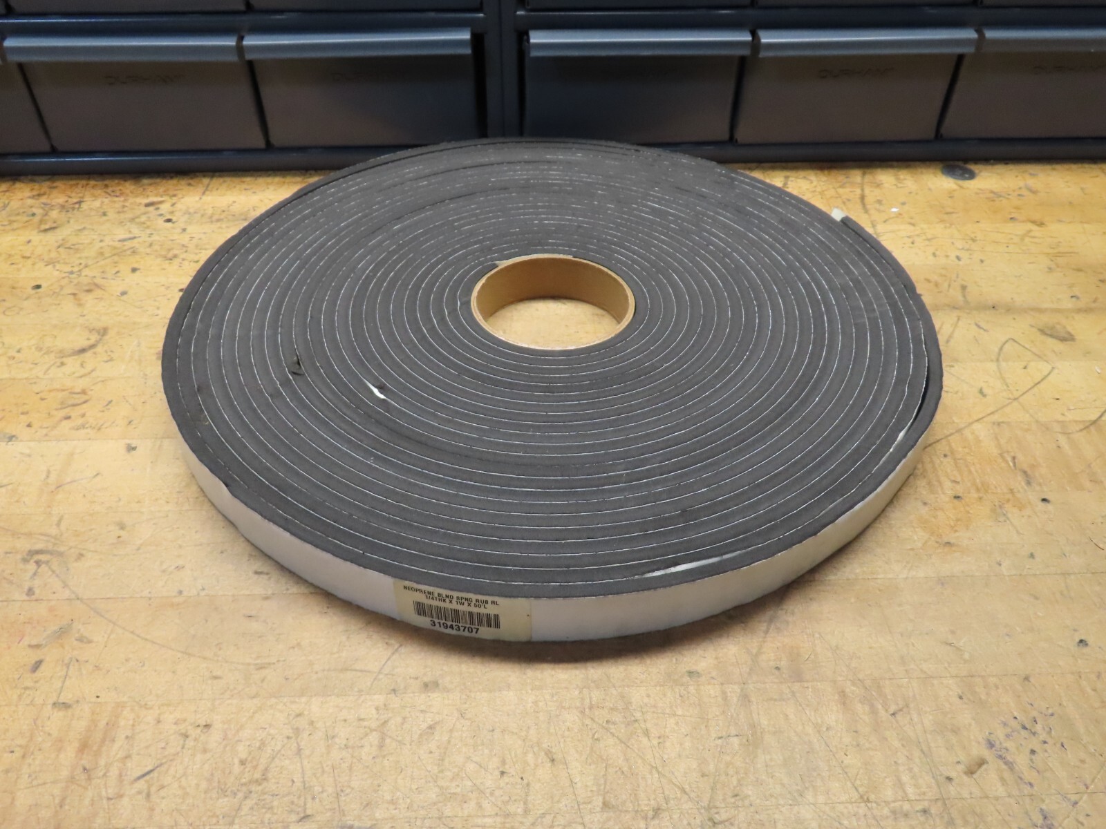Closed-Cell Neoprene blend spring rubber 50′ roll 1″ X 1/4″ thick adhesive back