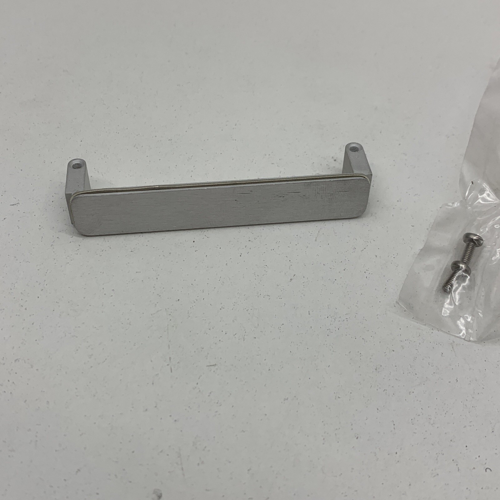 Emench Closure Plate