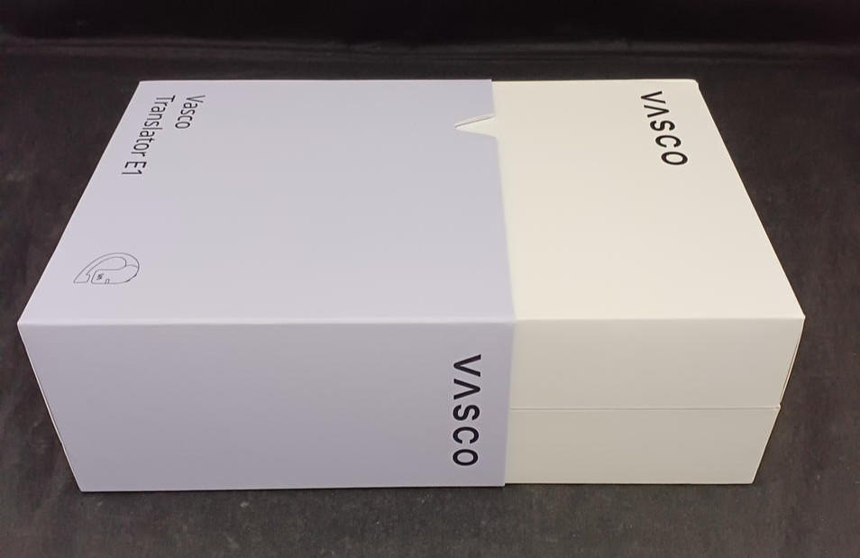 Used Vasco E1 earbuds Translator 50 languages with two earphones right side