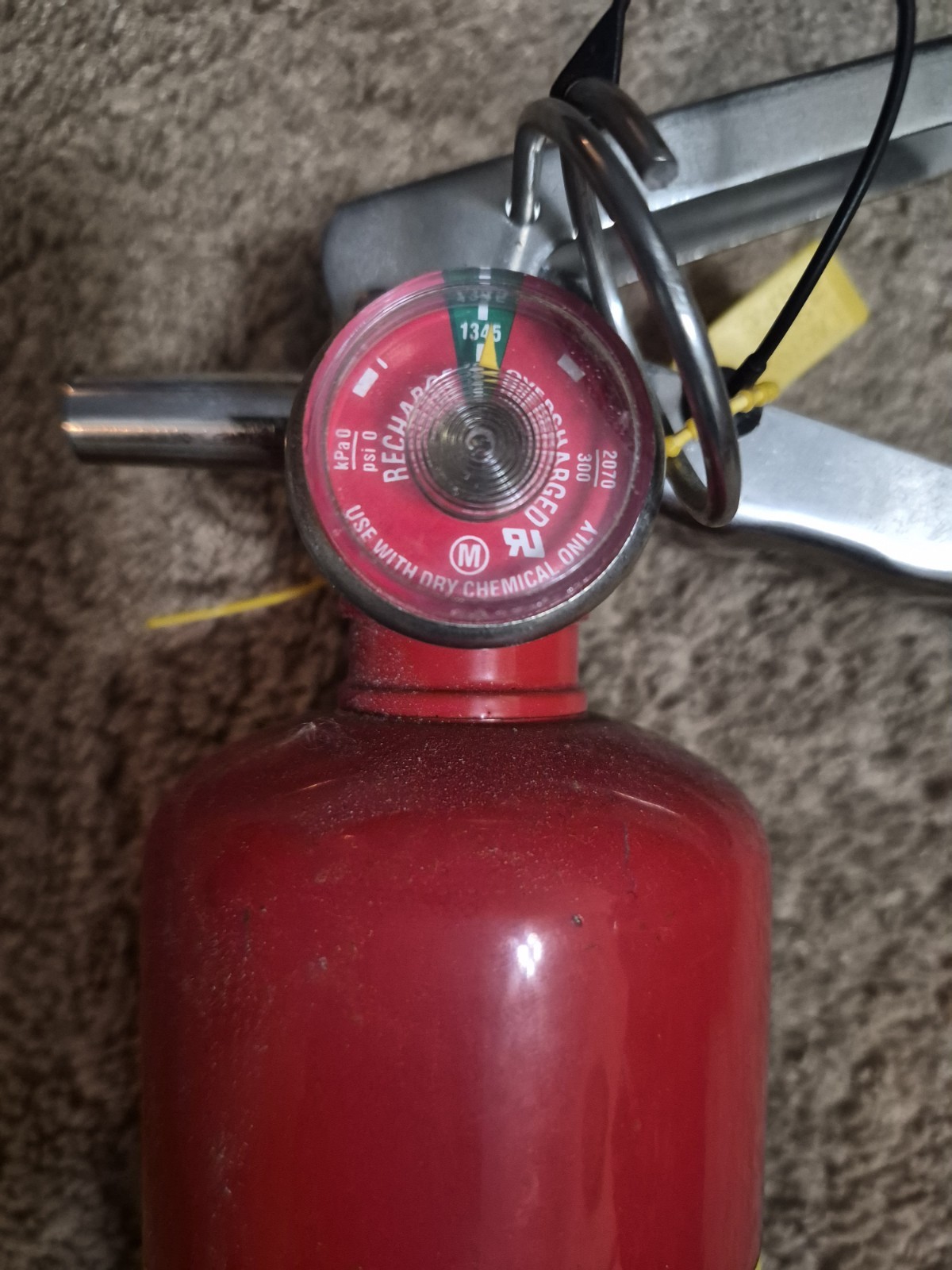 Badger 21007865 2.5 lb ABC Fire Extinguisher with Vehicle Bracket and insp. tag.