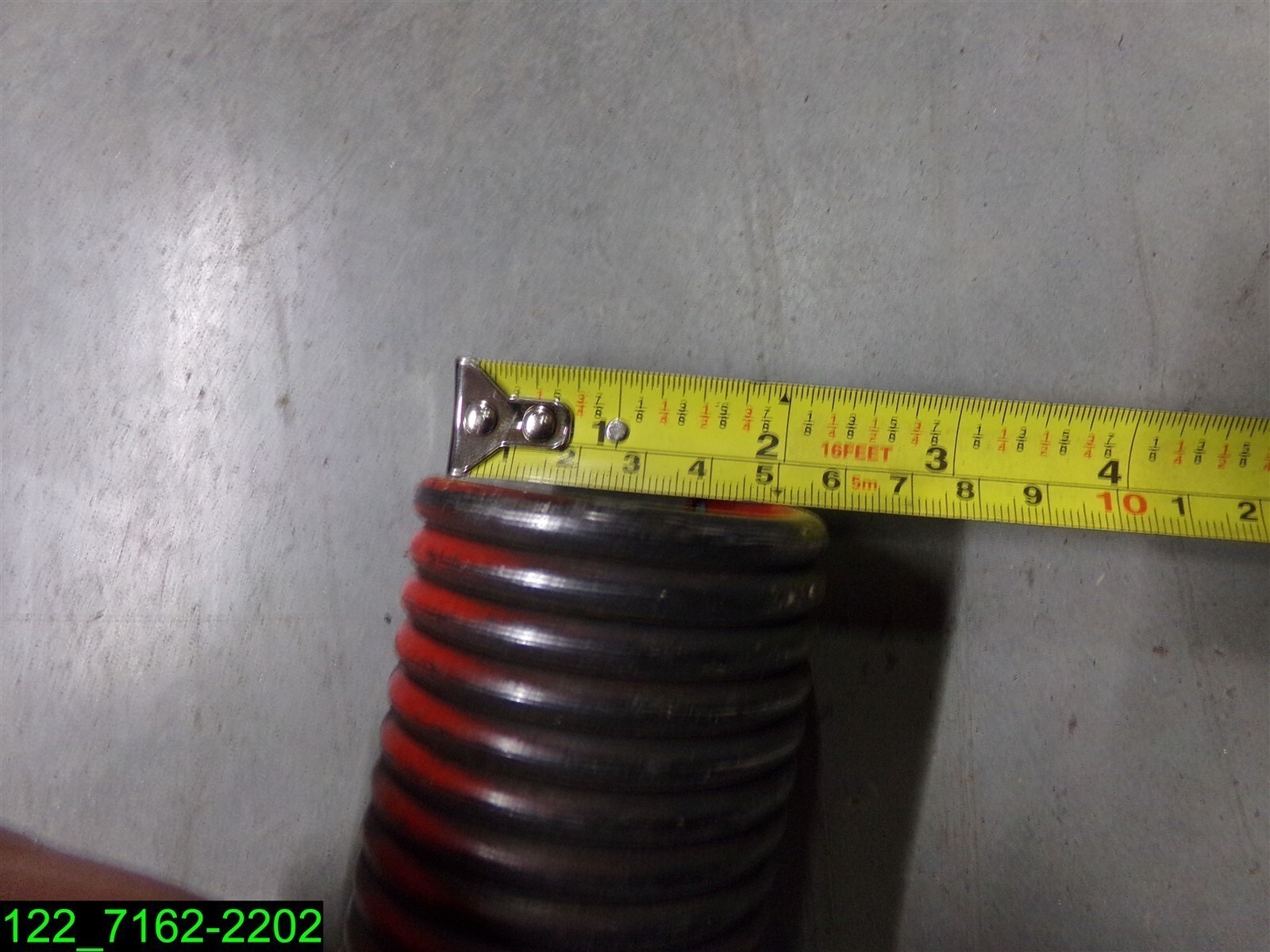 OVERHEAD DOOR SPRING 52″ LONG, 2-1/4″ OD, 1/4″ DIA.