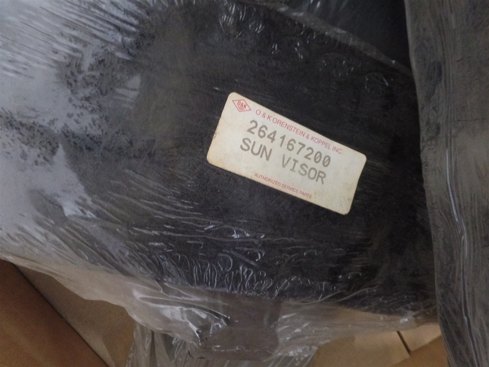 GENUINE O&K 264167200 SUN VISOR, TROJAN O&K 10264167200, TEREX 10-264167200, NOS