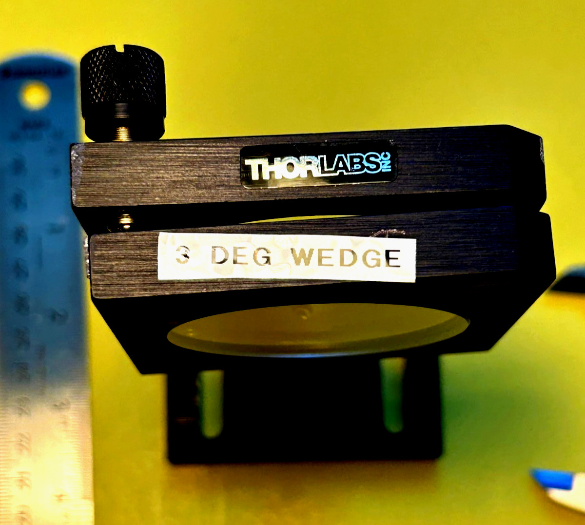 2″ dia. DUV grade CaF2 3 Degree wedge in Thorlabs 2″ mirror mt. with post holder