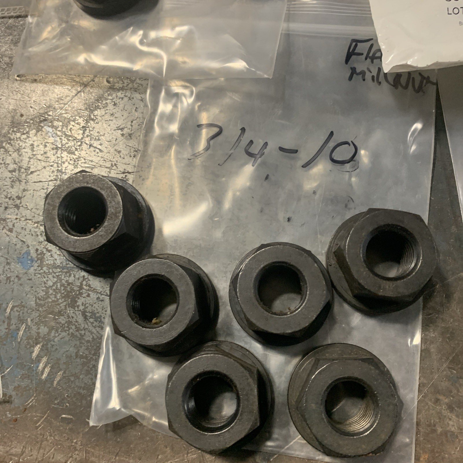 Flanged Mill Nut Assortment Lot. 3/8,7-16,1/2,3/4,7/8 & 1”