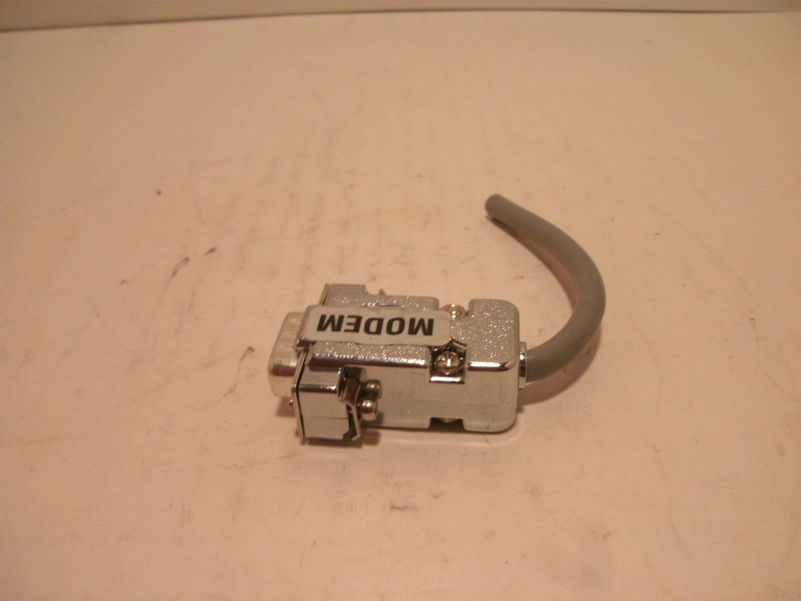 GENERIC MODEM PLUG 9 PIN WITH 3 INCH CORD PLASTIC PLUG CHROME FINISH