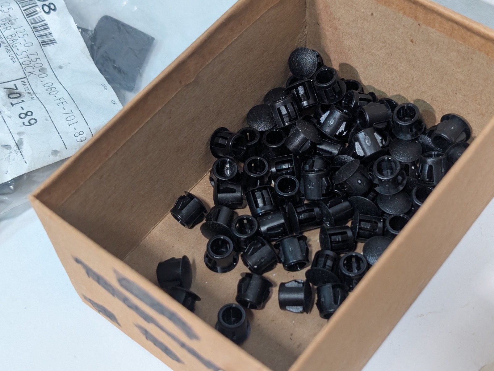 Lot of Approx. 700 Assorted Plastic Caps and Car Plugs, Various Sizes