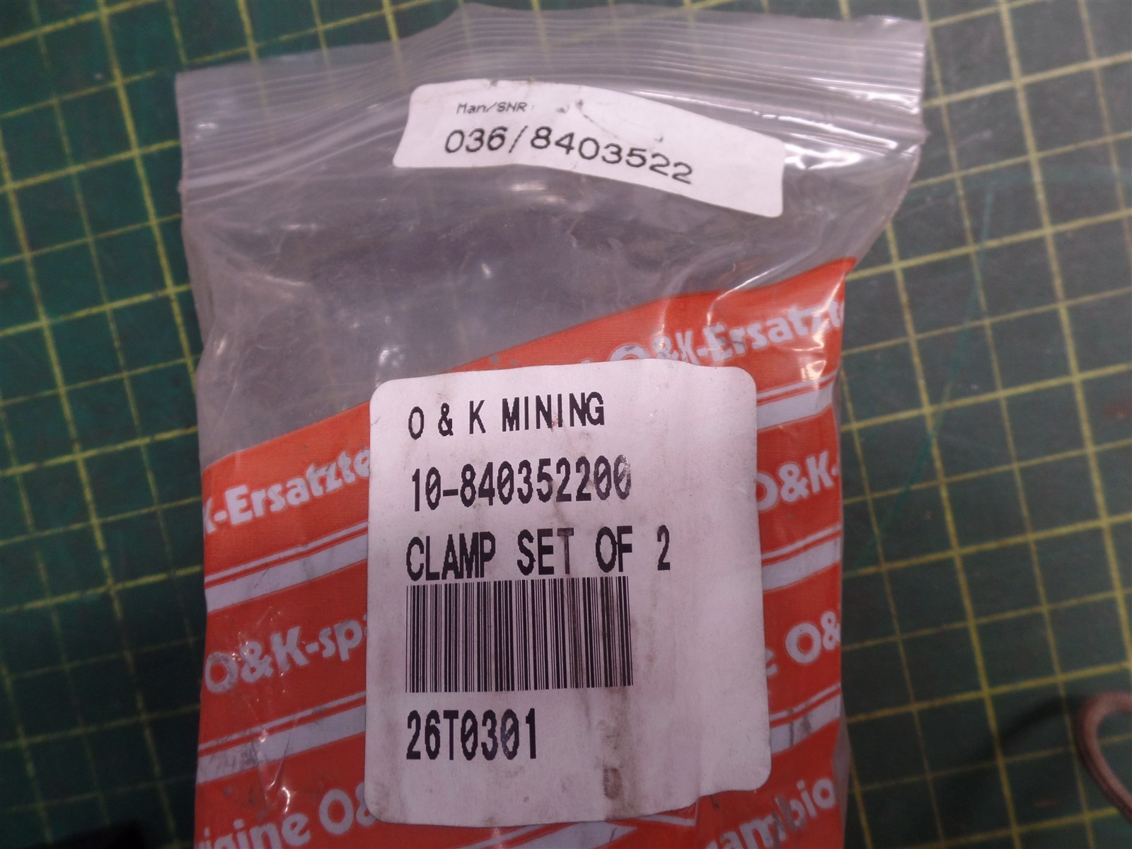 GENUINE TROJAN o7K 10840352200 CLAMP SET, TEREX 10-840352200, 842352200, N.O.S