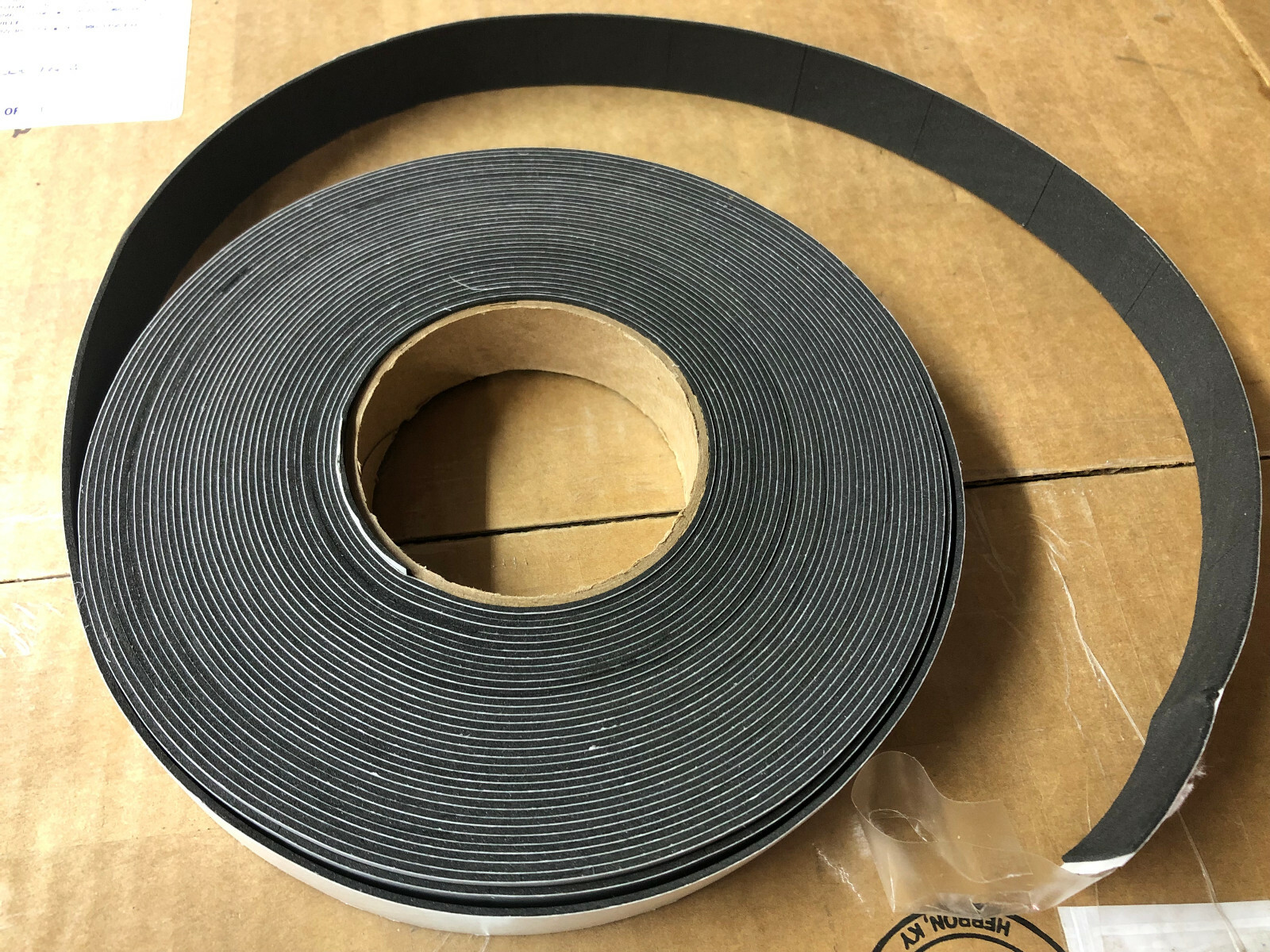 Roll of 1750 pieces 1-5/8″ x 1″ x 1/16″ thick Neoprene rubber sponge/pad