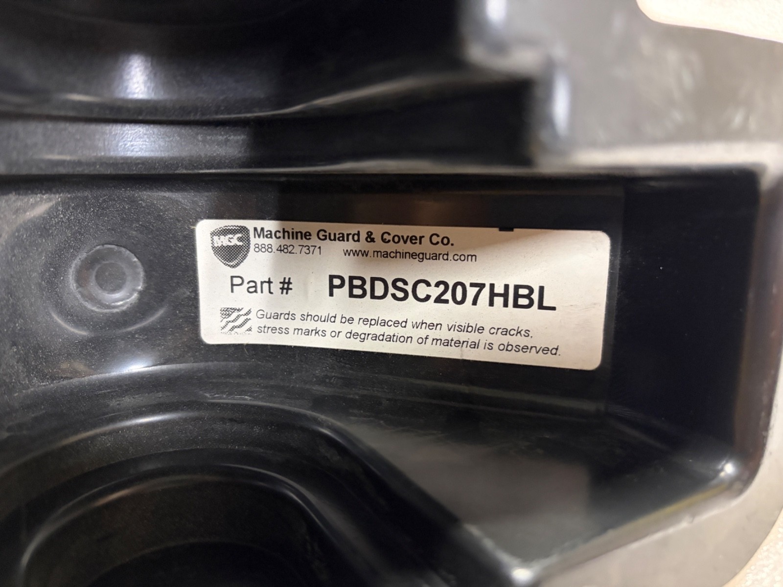 Machine Guard & Cover Co. Part no. PBDSC207HBL bearing flanged Saftey cover