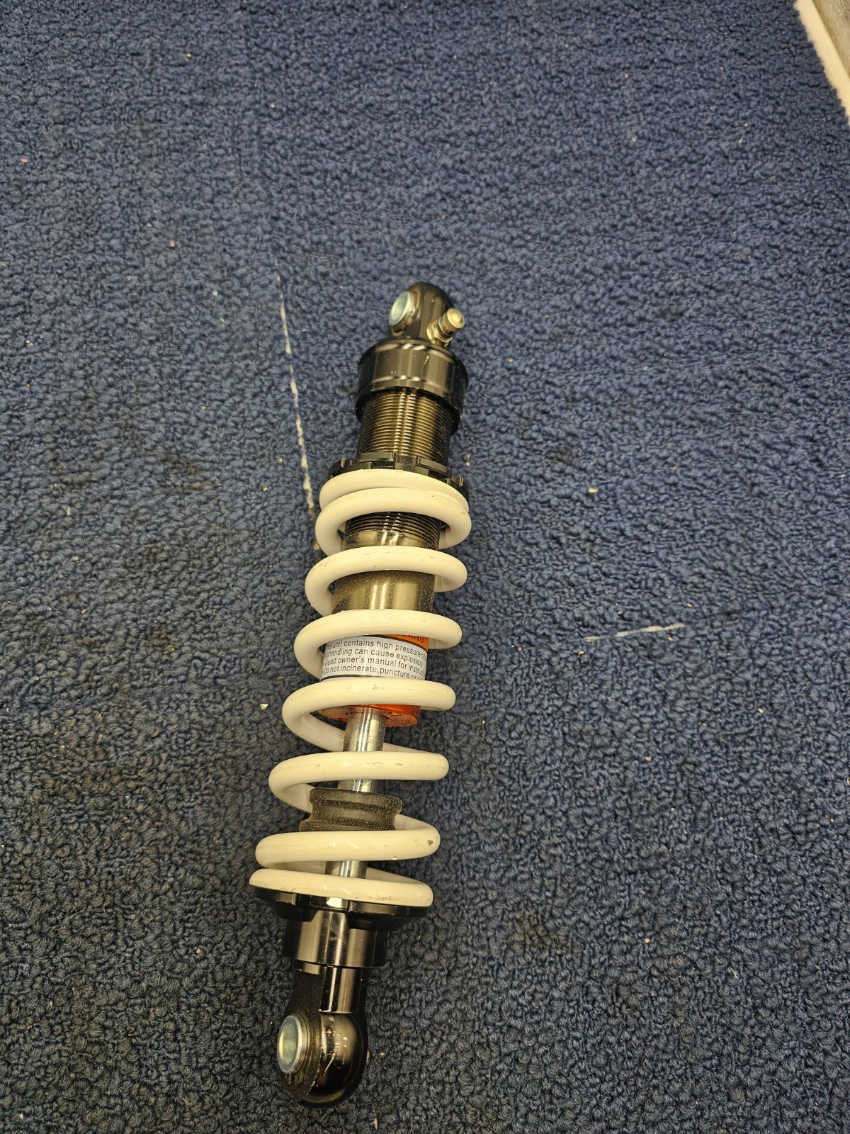 2508231141 Adjustable Shock Absorber Black Body, White Spring