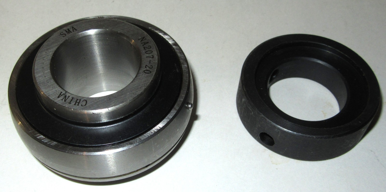 SMA NA207-20 Eccentric Collar, Ball Bearing Insert 1-1/4″ Bore W/ Pillow Block