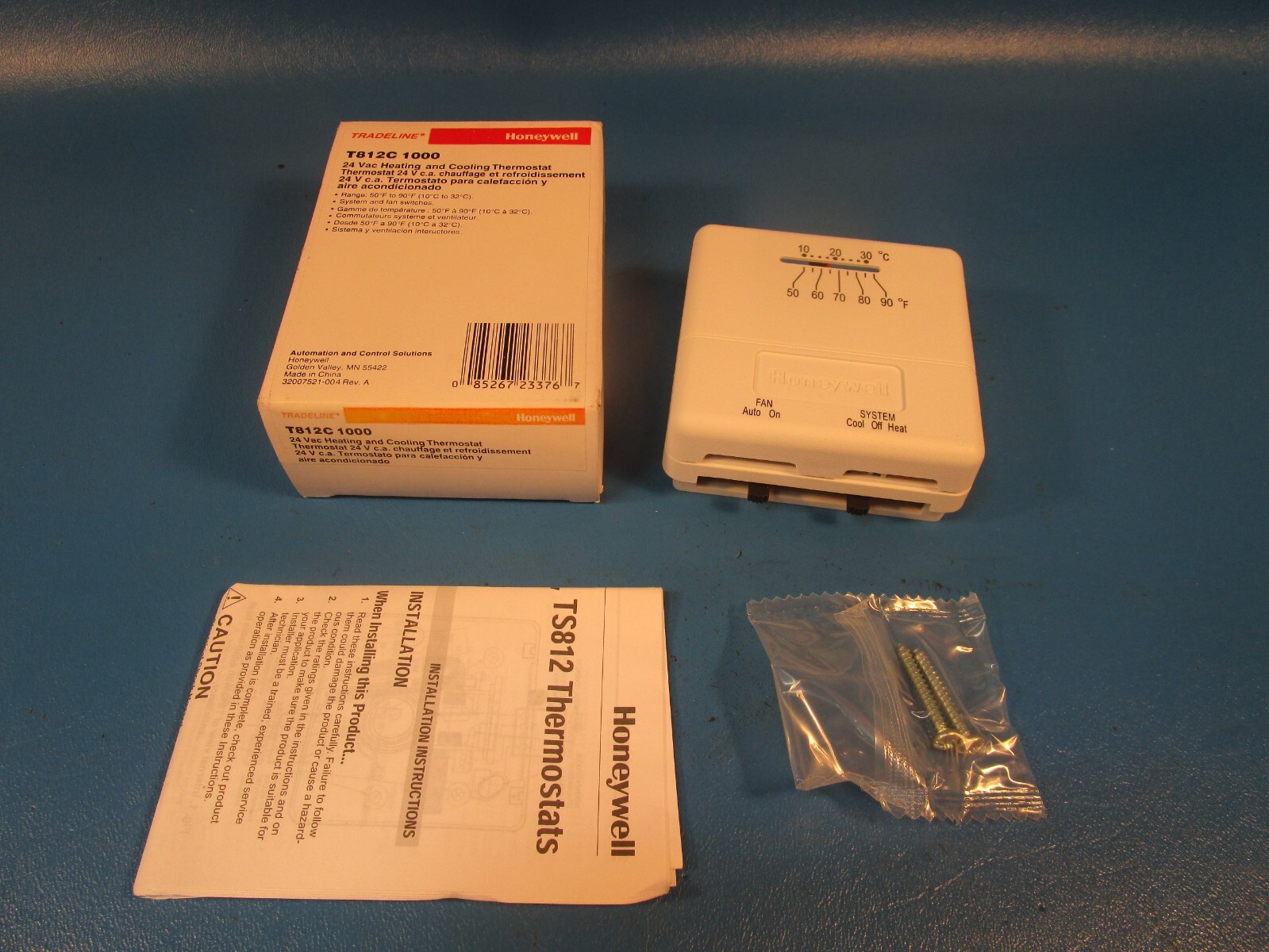 Honeywell T812C 1000, 24VAC Heating and Cooling Thermostat 24V