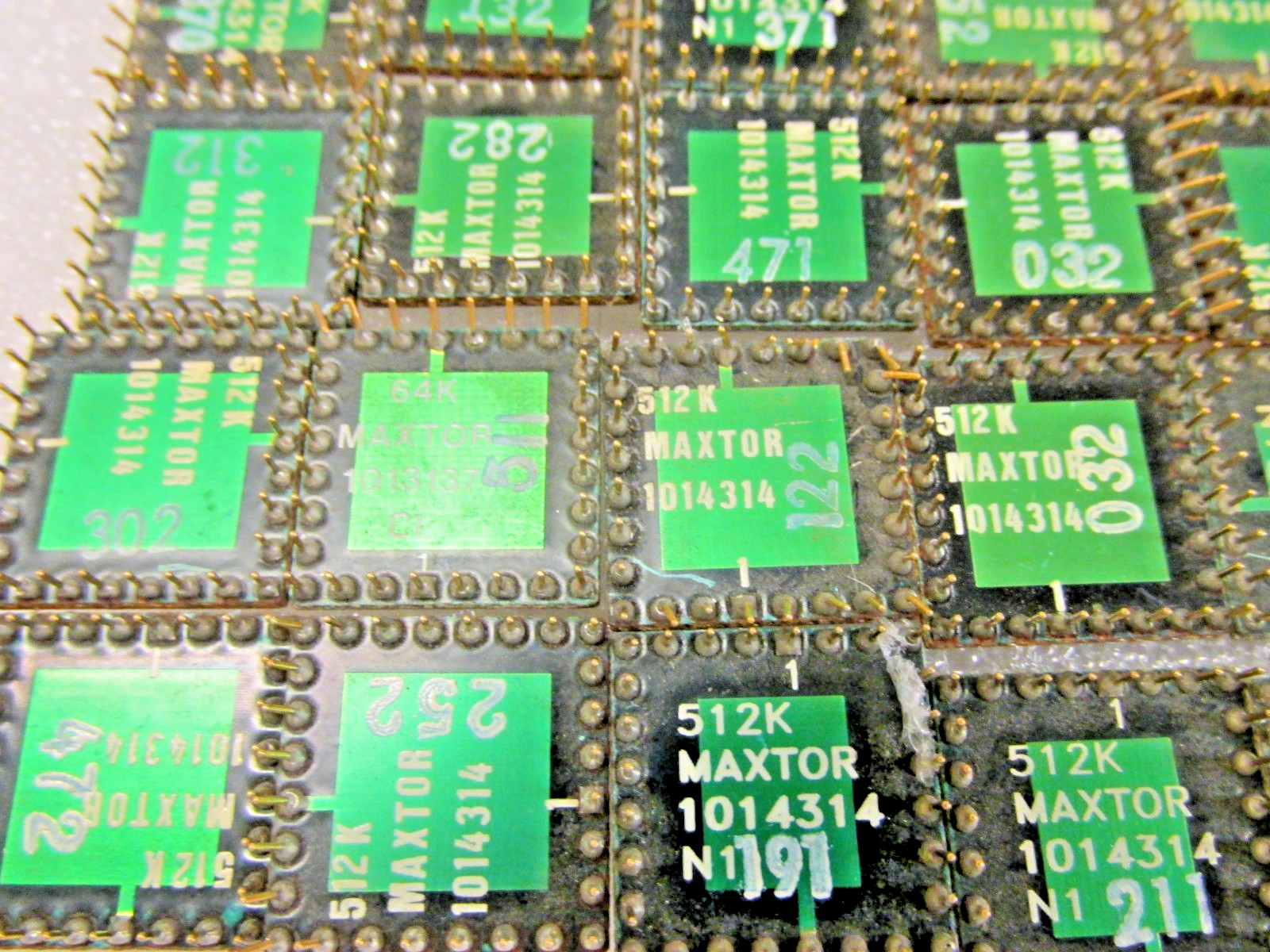 Lot of 34 MAXTOR PROMs Gold top and legs – Scrap for Gold Recovery.