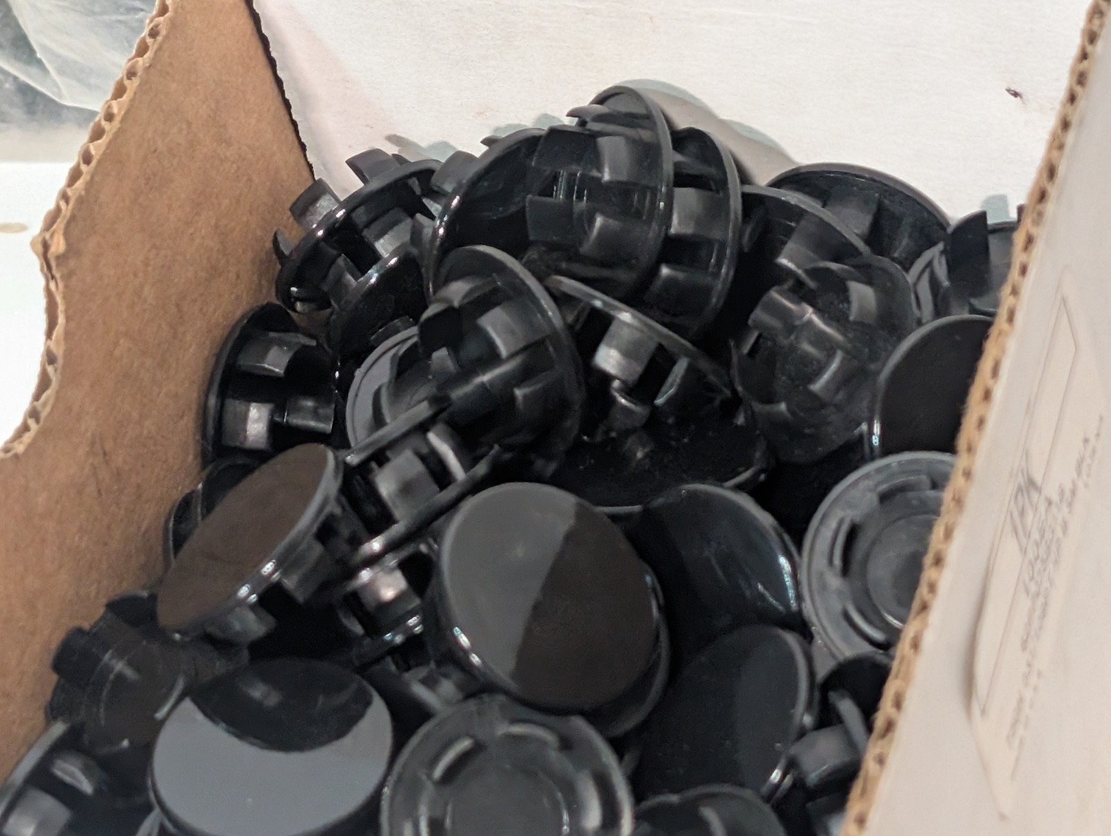 Lot of Approx. 700 Assorted Plastic Caps and Car Plugs, Various Sizes