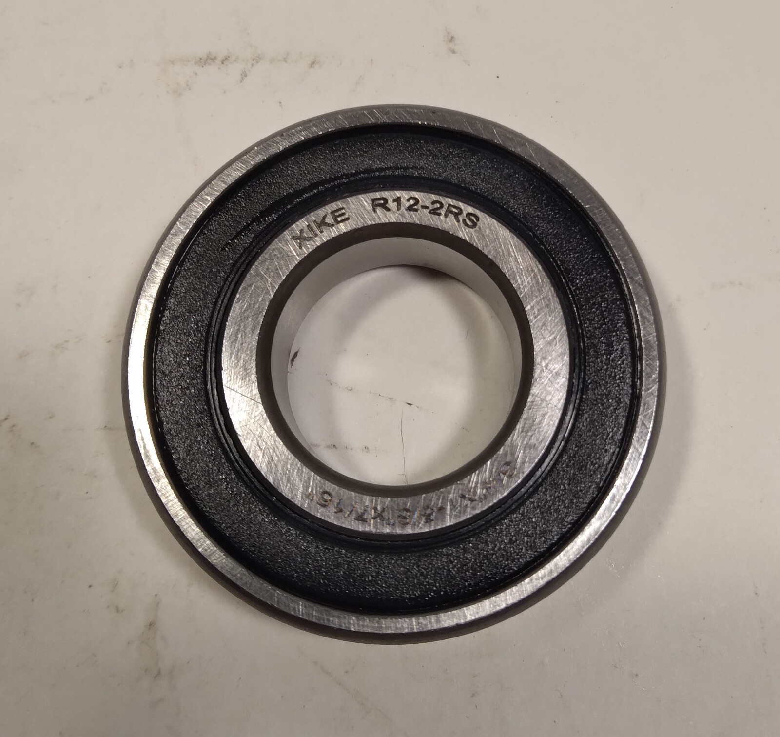 2 NEW XIKE BEARINGS R12-2RS RUBBER SEALED BALL BEARINGS NNB ***MAKE OFFER***