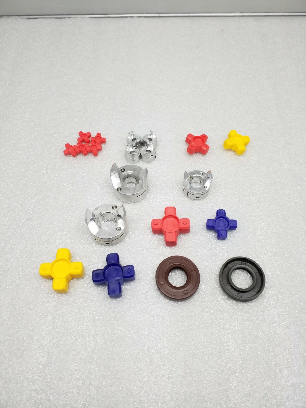 RULAND MANUFACTURING ASSORTED JAW COUPLING HUBS, SPIDERS, SEAL, AND RADIAL SHAFT