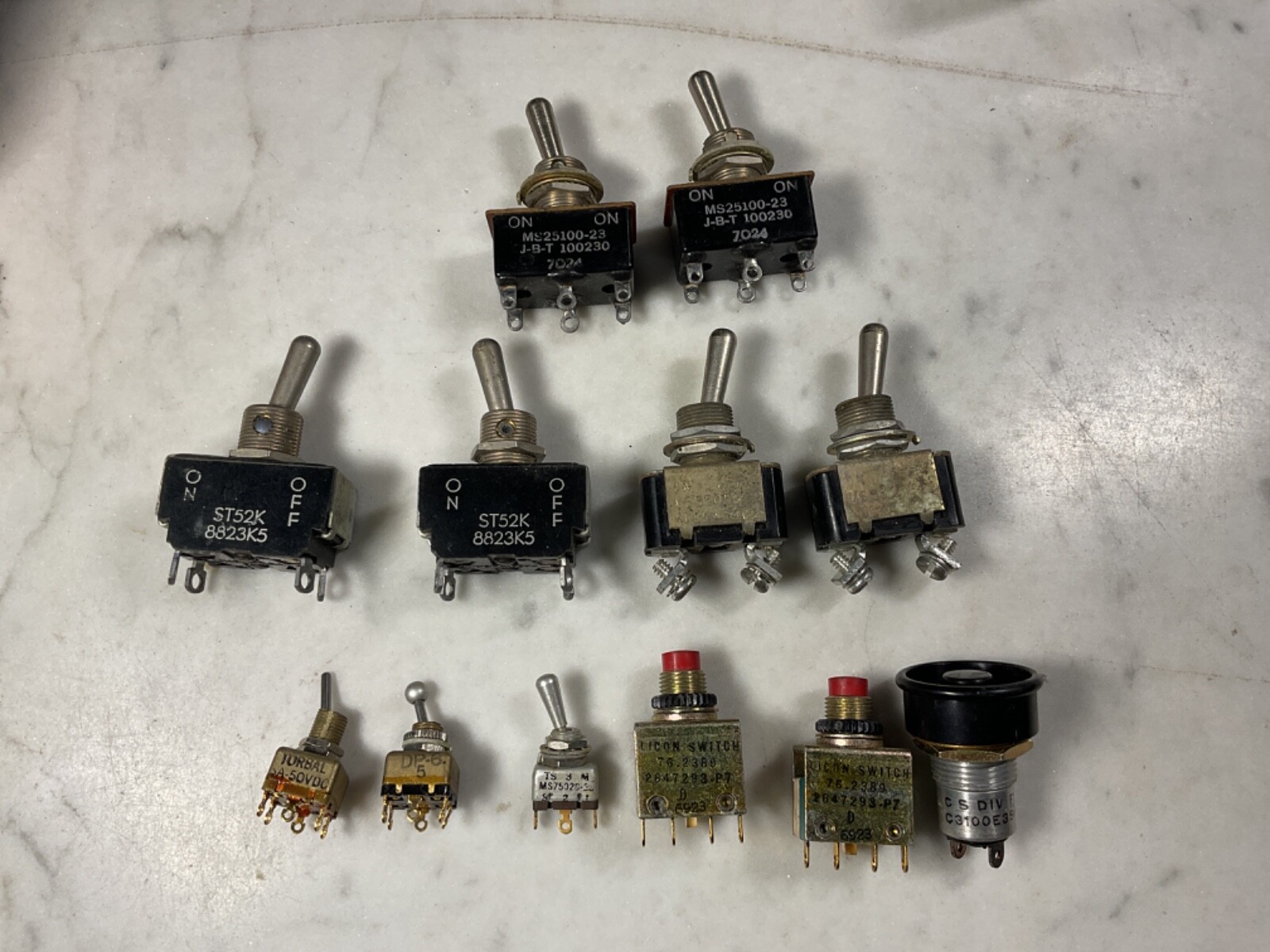 12 Toggle Switches and Push Buttons