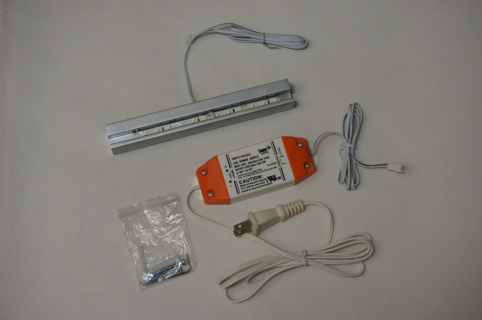 Sign Rail with White LED Lights Create A Backlit Display, Silver Satin
